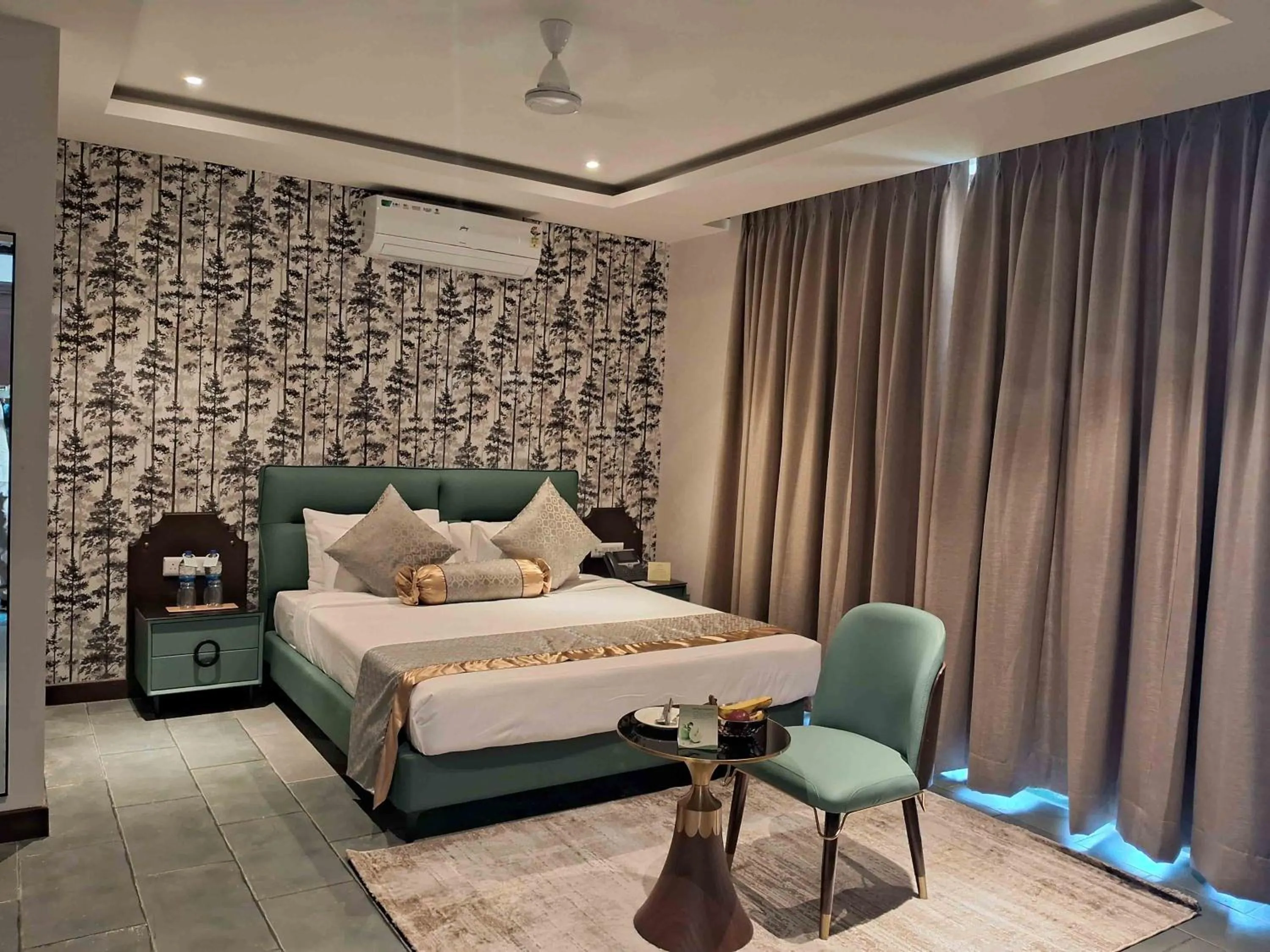 Bed in Debu's The Fern Resort & Spa, Jim Corbett, Series by Marriott