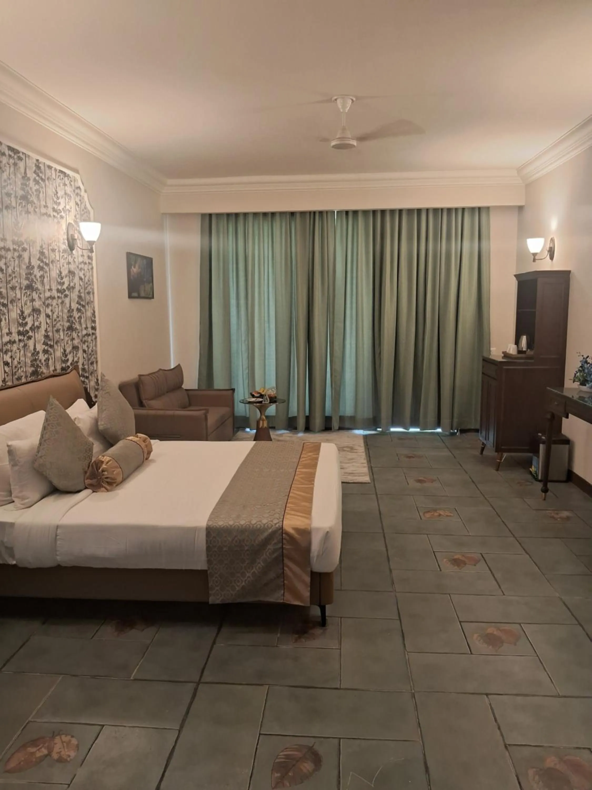 Bed in Debu's The Fern Resort & Spa, Jim Corbett, Series by Marriott