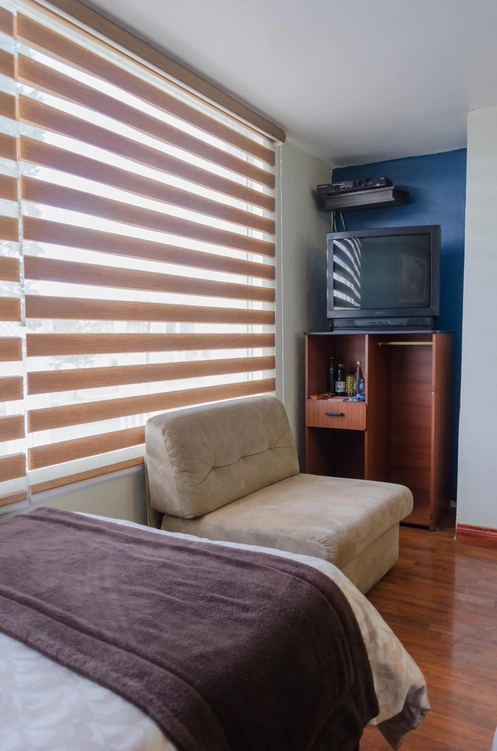 Seating area, Bed in Hotel El Altar
