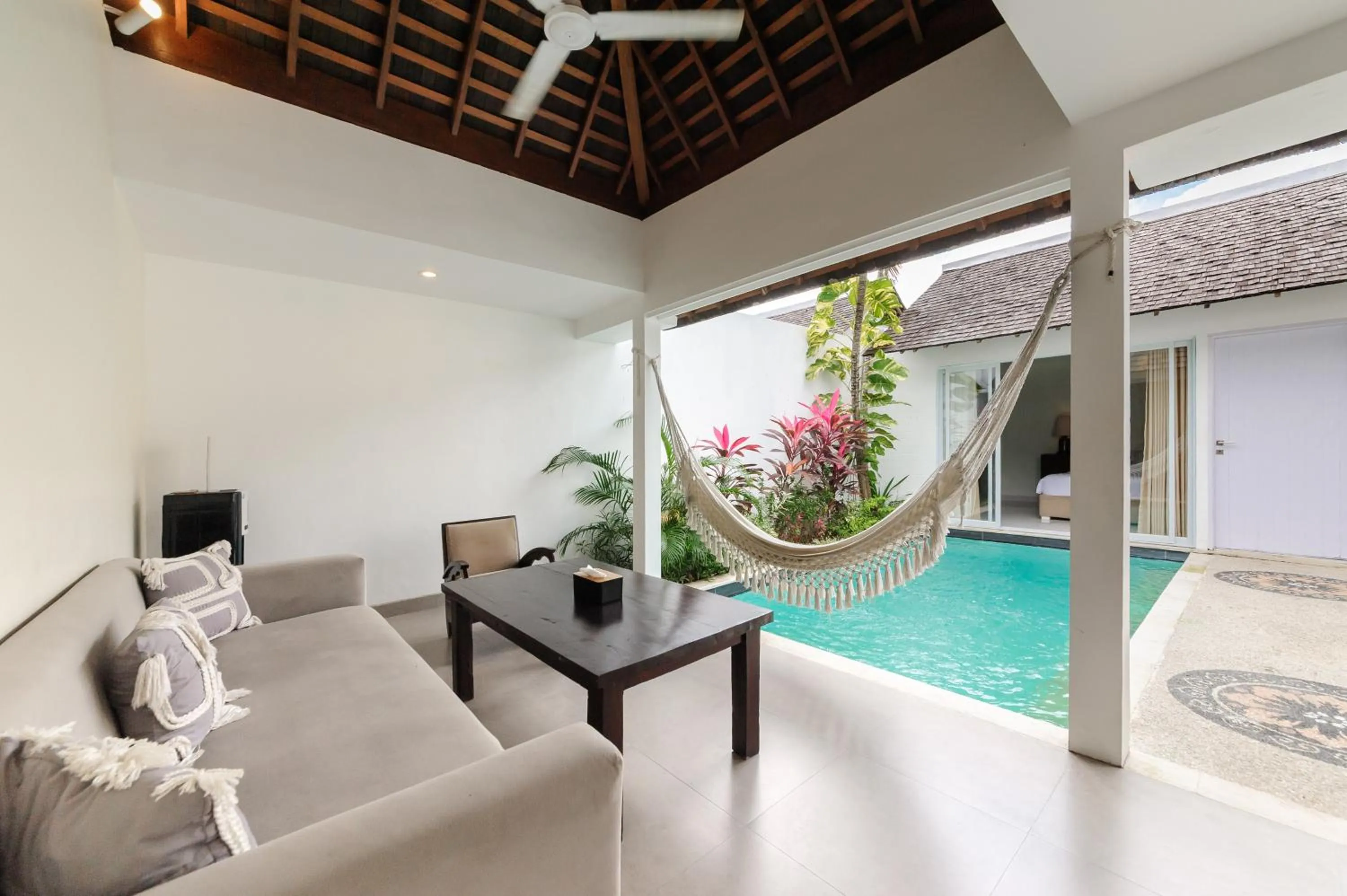 Seating area in Tan's Astana Villa's by The Lavana