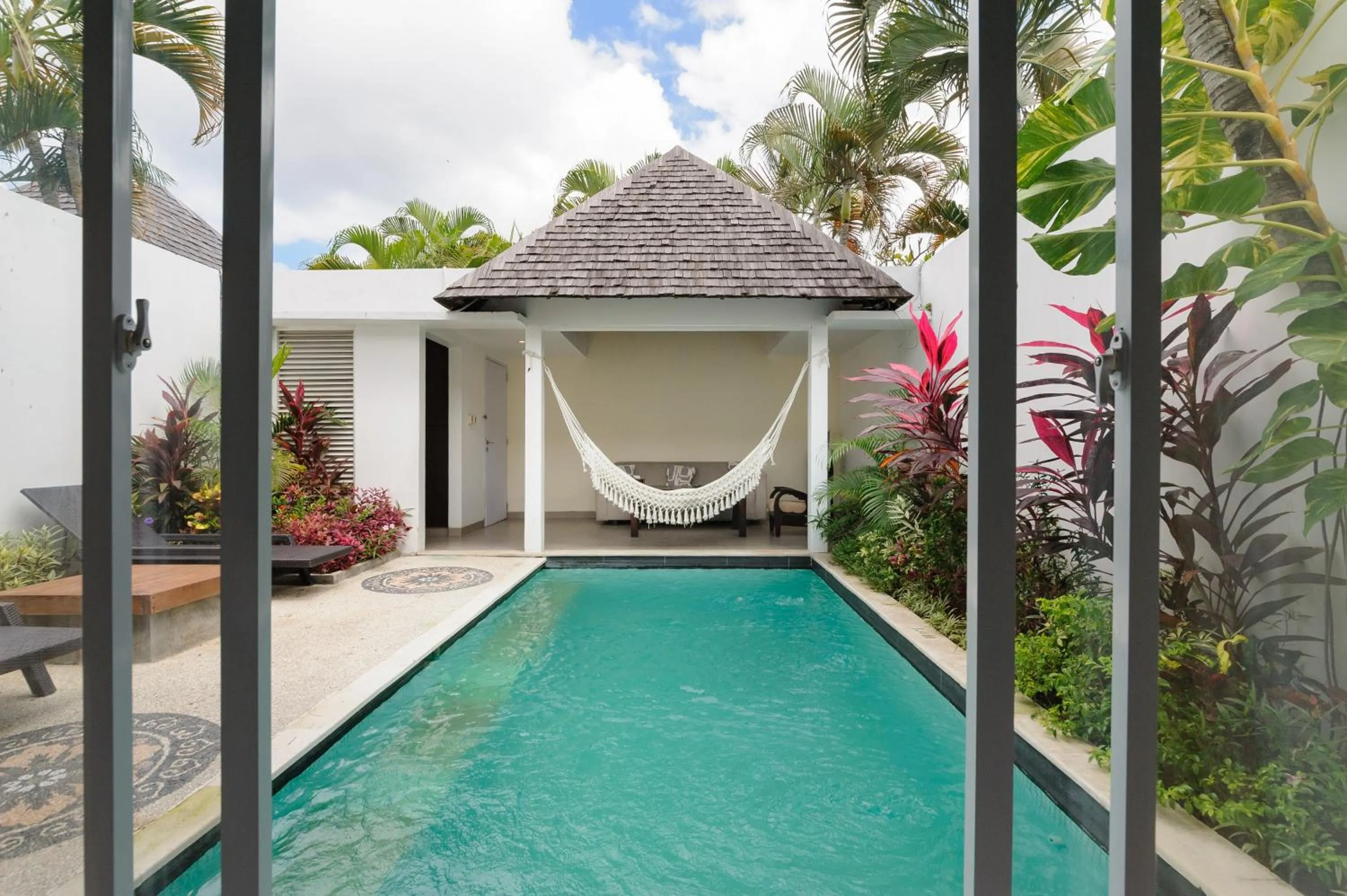 Swimming pool in Tan's Astana Villa's by The Lavana
