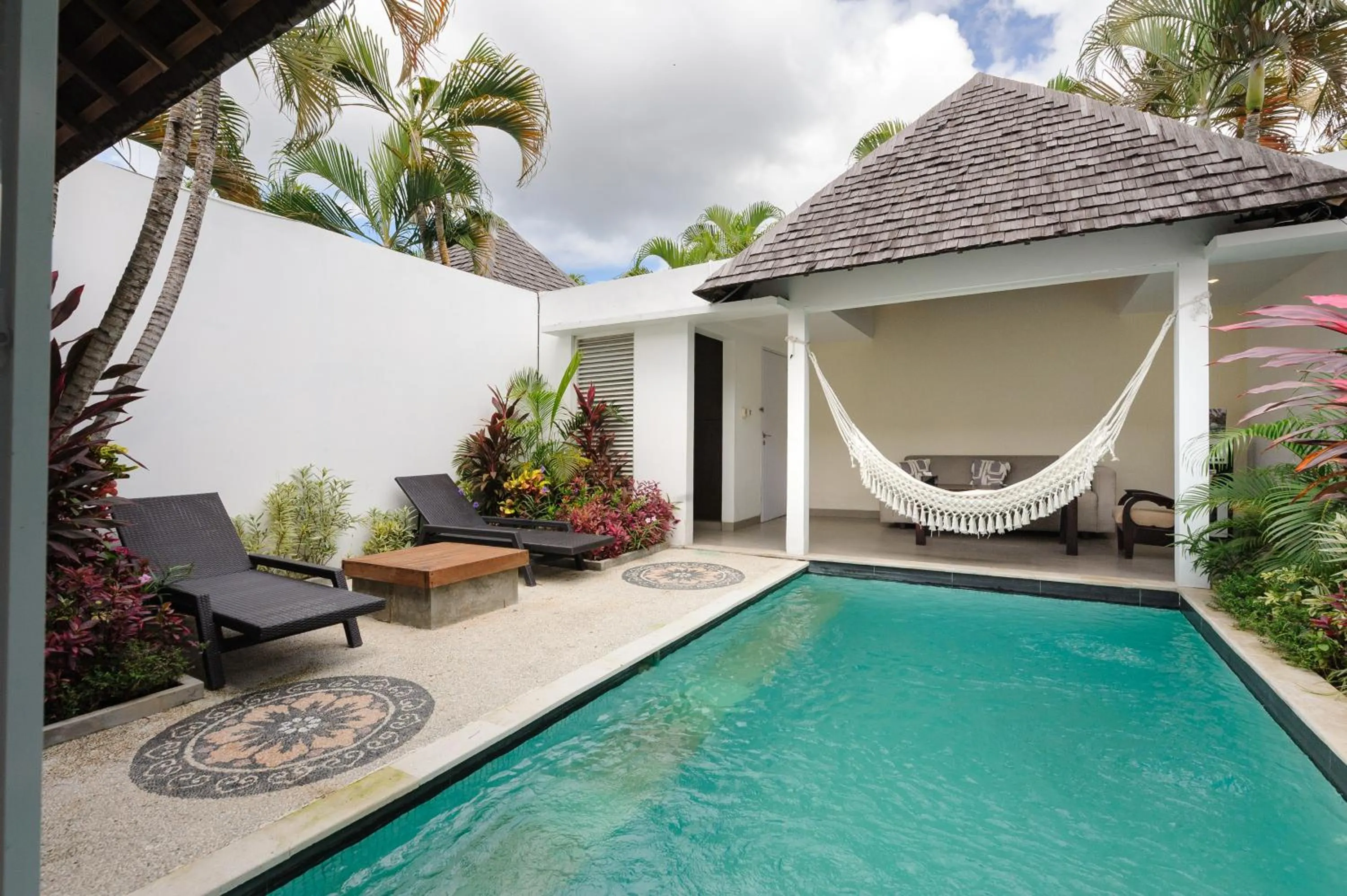 Swimming pool in Tan's Astana Villa's by The Lavana