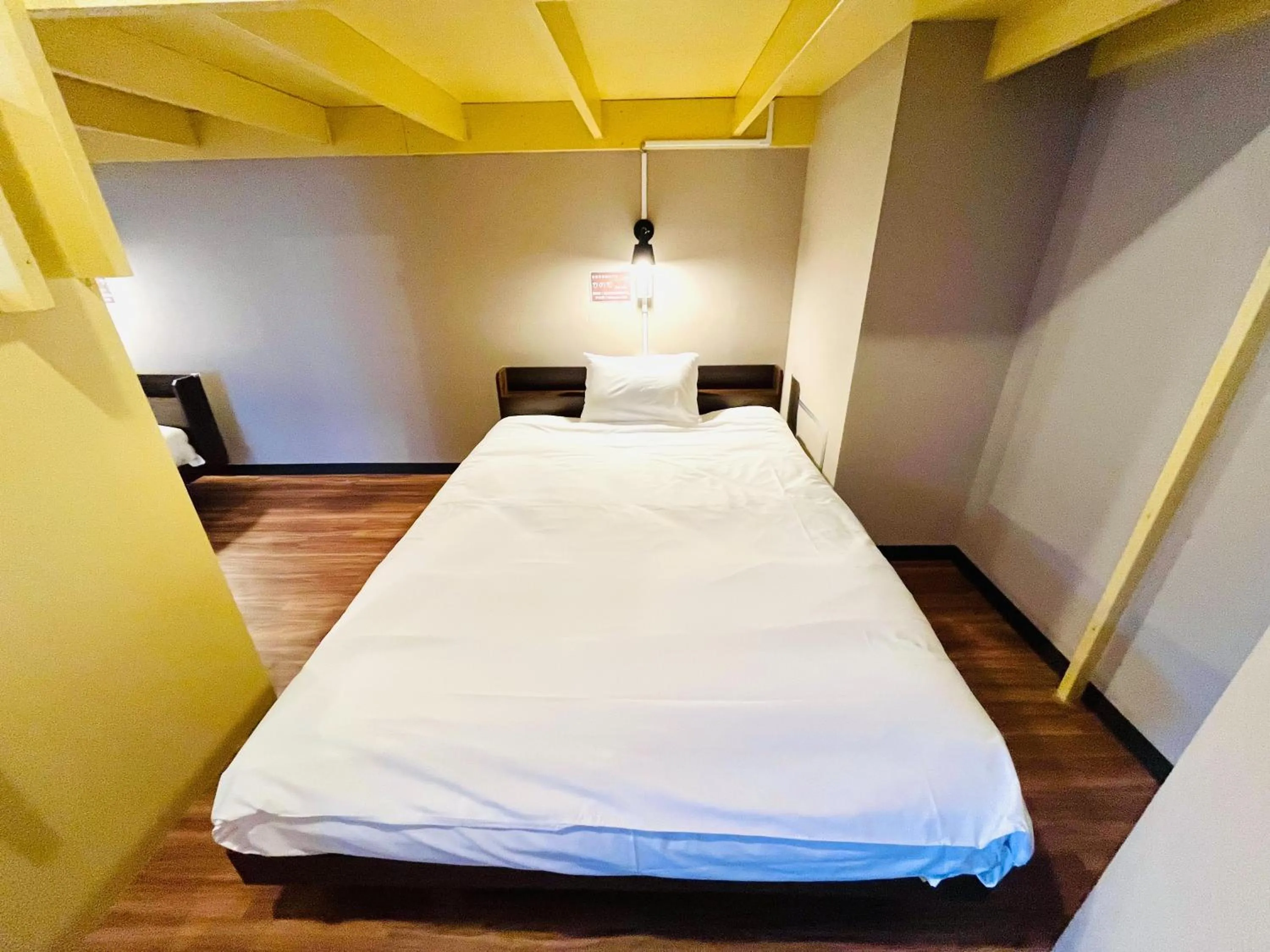 Bed in Hinode Kagurazakaekimae Hotel