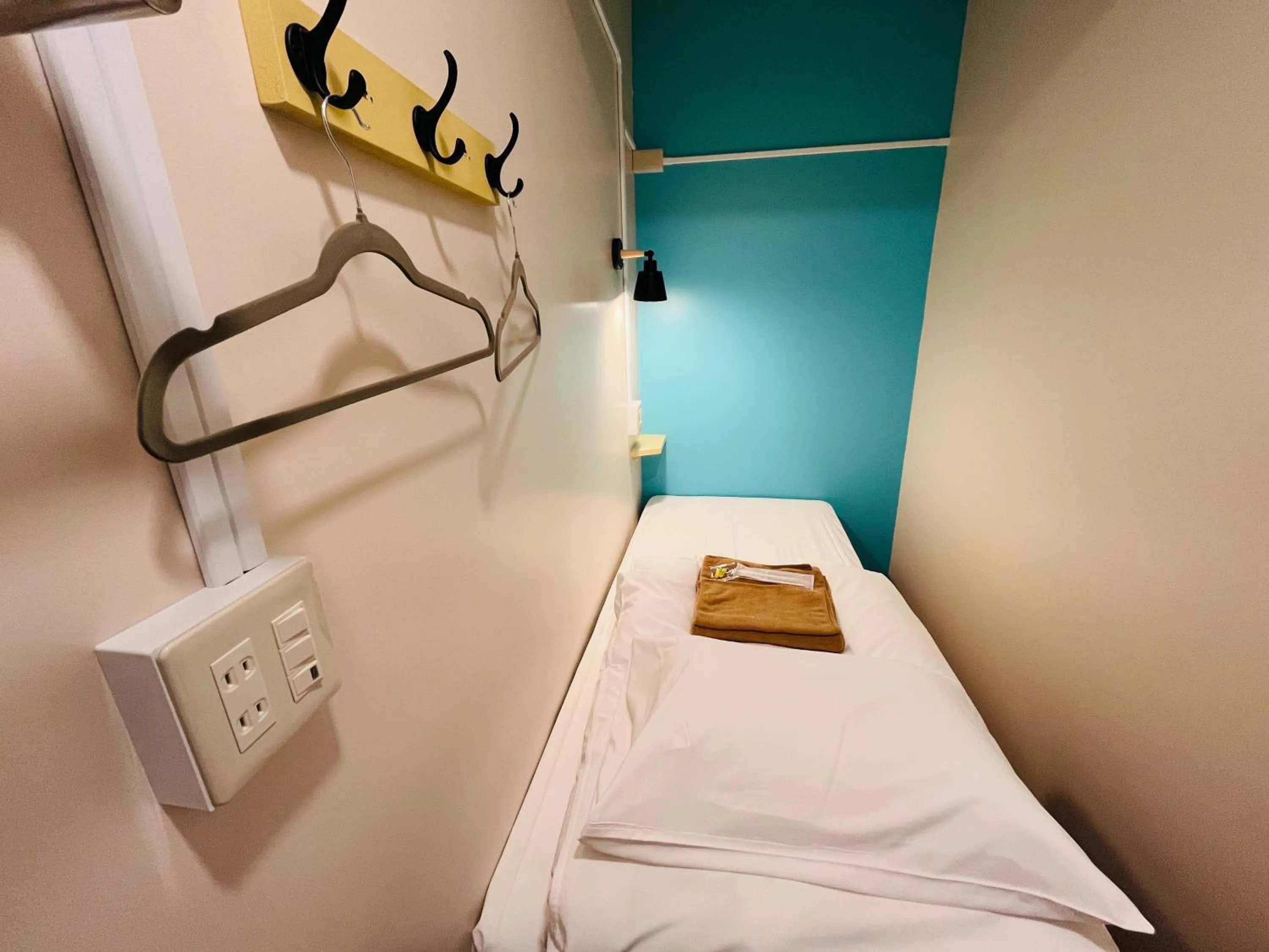 Bed in Hinode Kagurazakaekimae Hotel