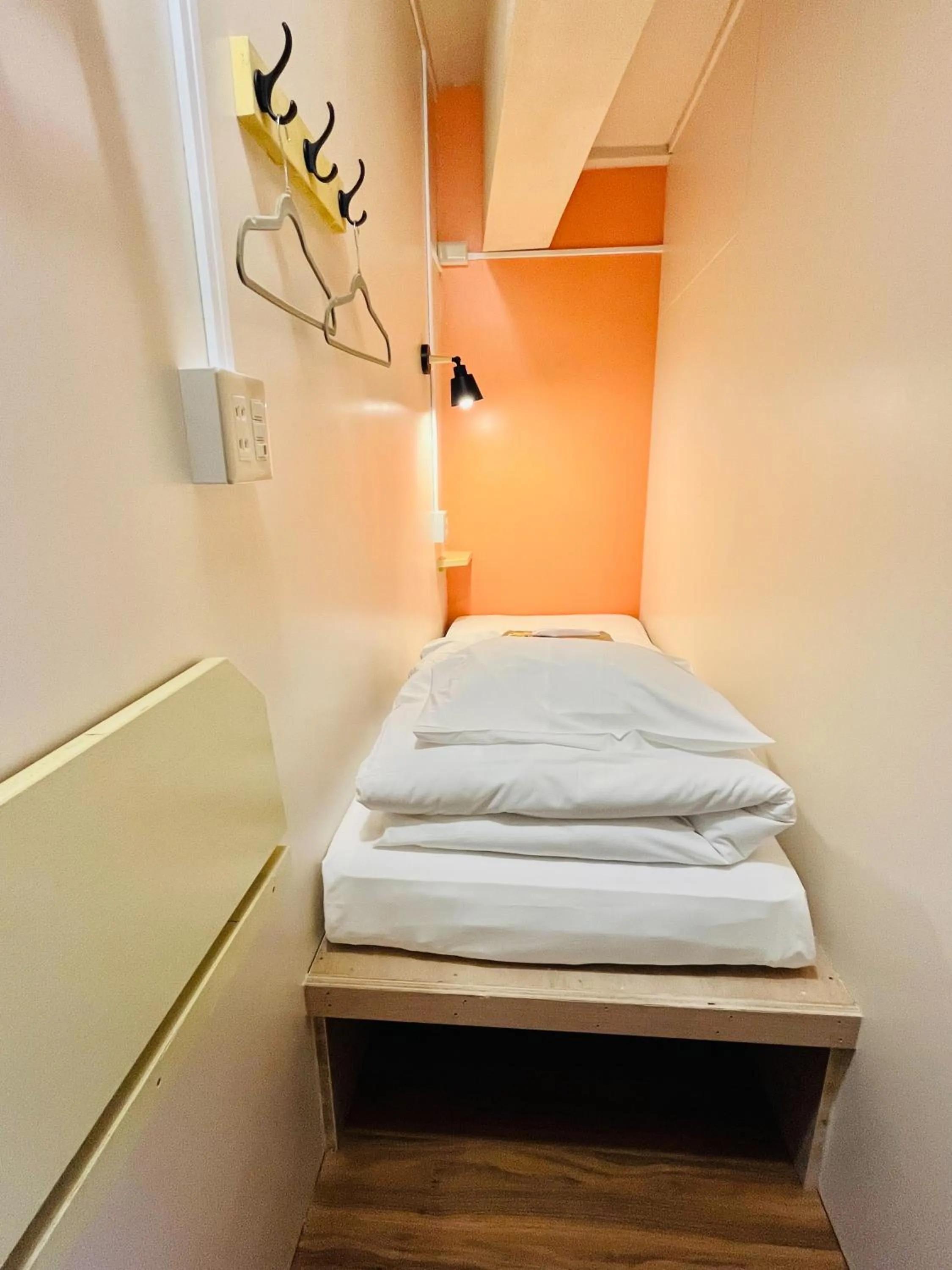 Bed in Hinode Kagurazakaekimae Hotel