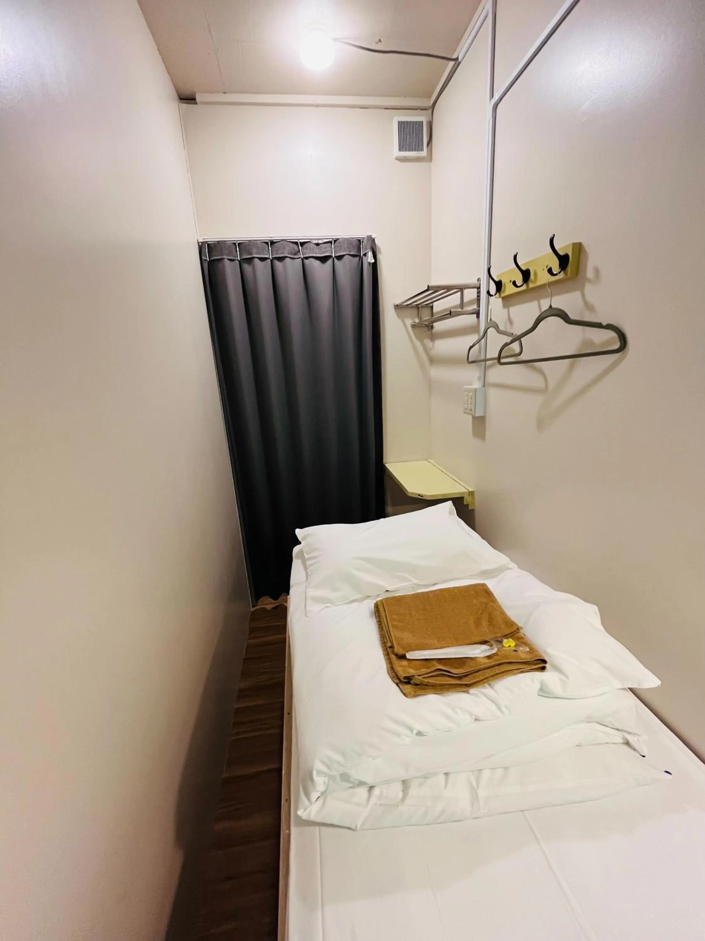 Bed in Hinode Kagurazakaekimae Hotel