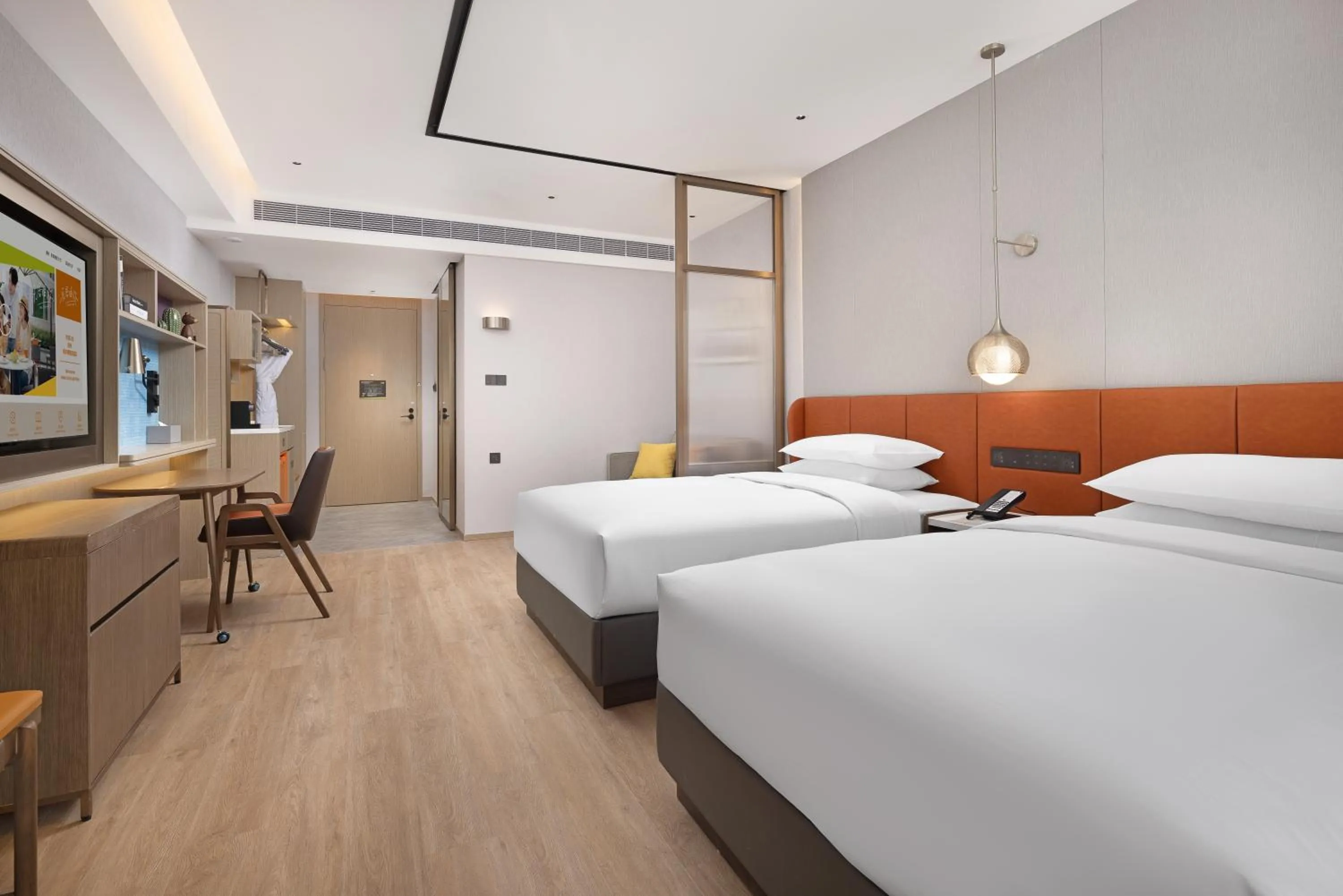 Bed in Home2 Suite by Hilton Chaozhou