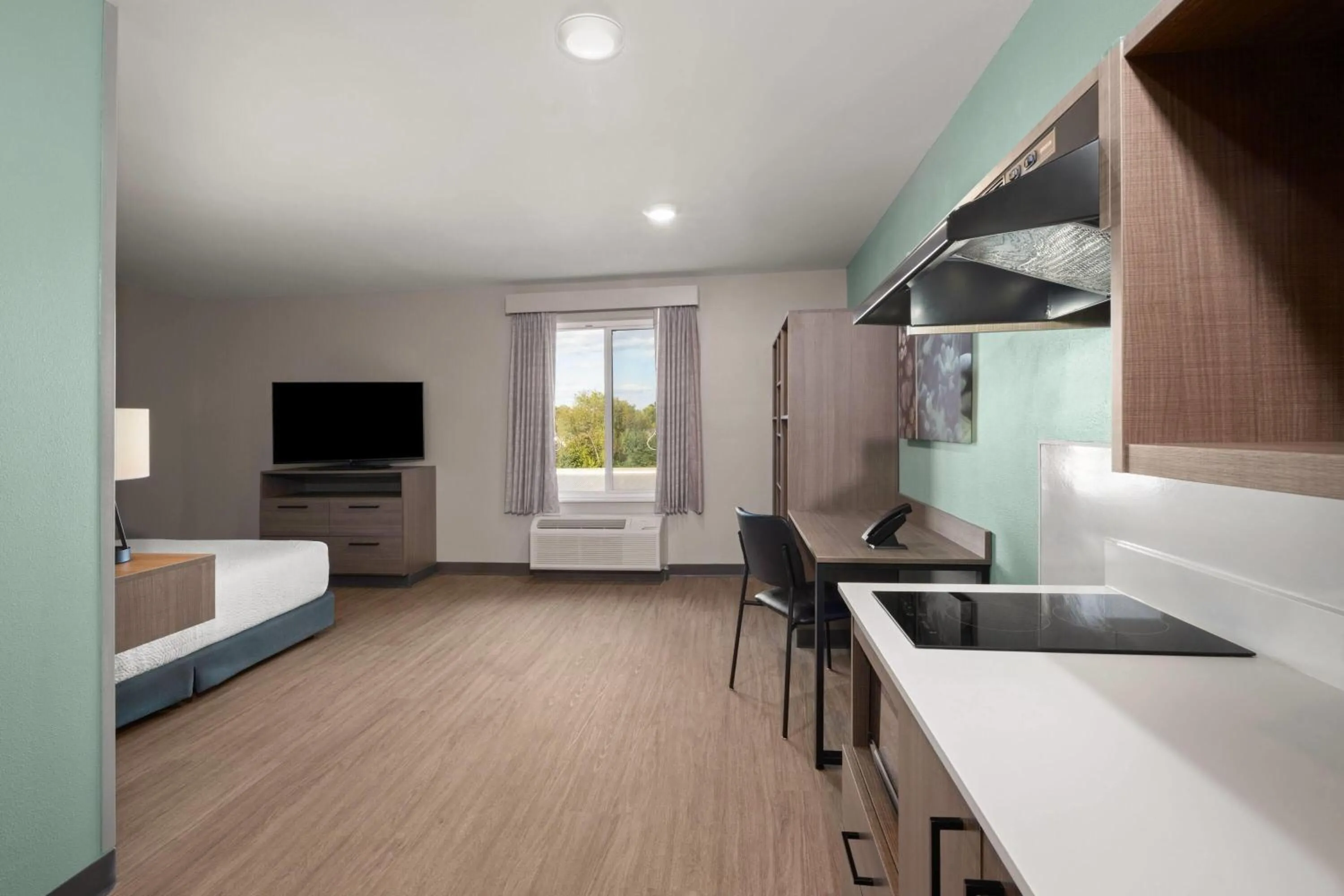Kitchen or kitchenette, Bed in ECHO Suites Extended Stay by Wyndham Johnson City Medical CR