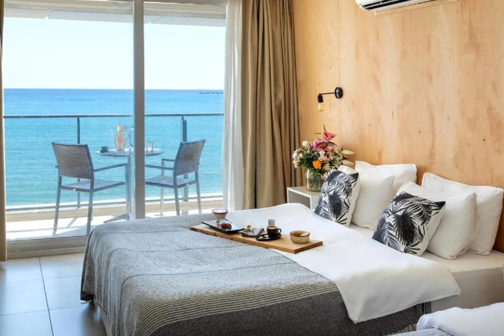 Bedroom, Bed in En Vie Beach Boutique Hotel - Adults Only