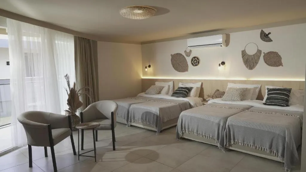 Bedroom, Bed in En Vie Beach Boutique Hotel - Adults Only