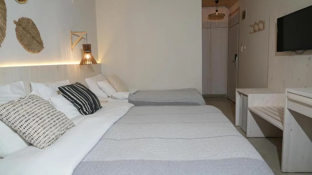 Bedroom, Bed in En Vie Beach Boutique Hotel - Adults Only