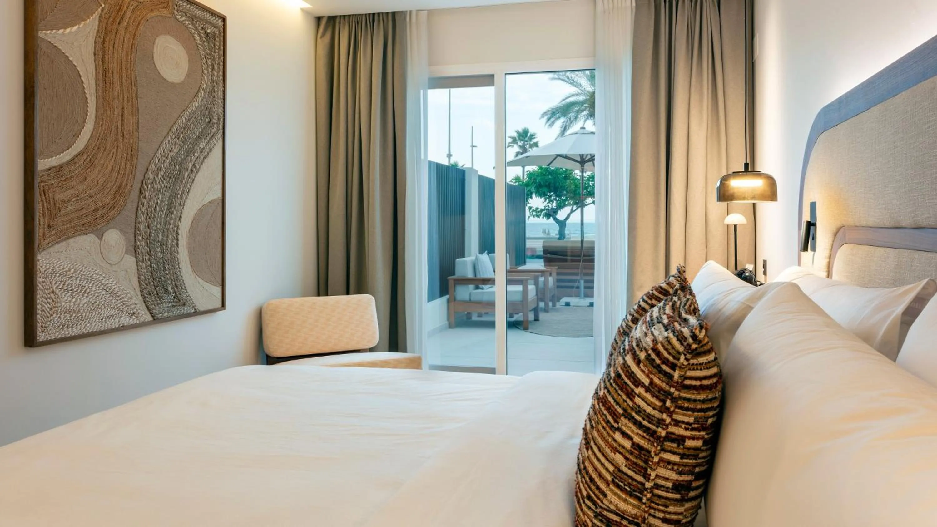 Photo of the whole room, Bed in Hotel Indigo Gandia Beach by IHG