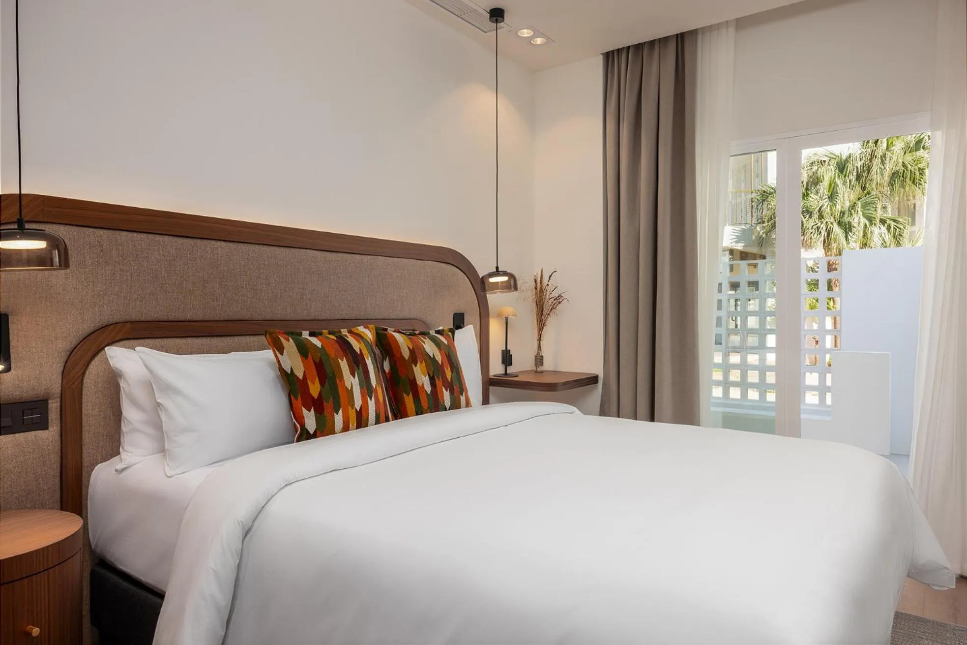 Bed in Hotel Indigo Gandia Beach by IHG