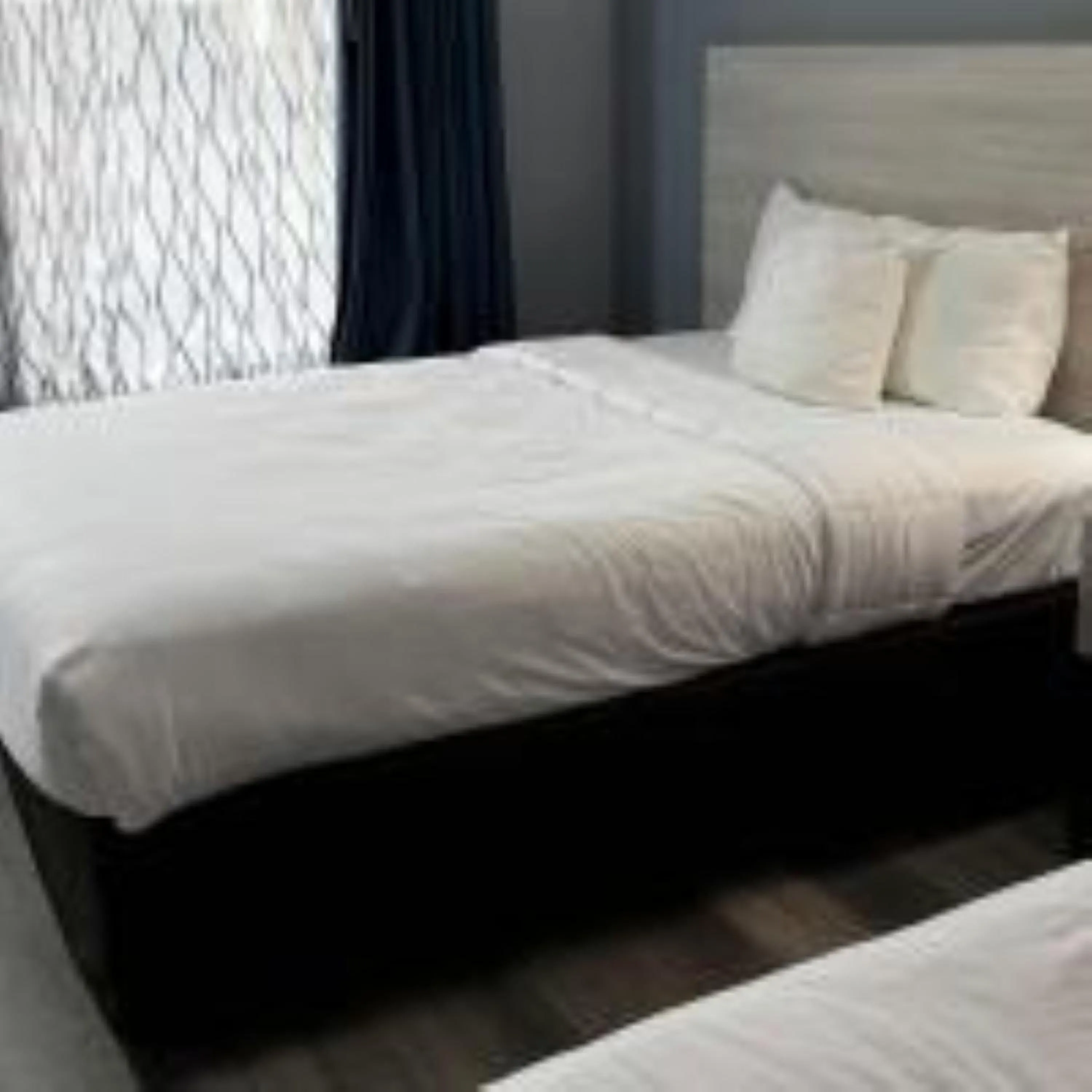 Bed in Suburban Studios Christiansburg - Blacksburg