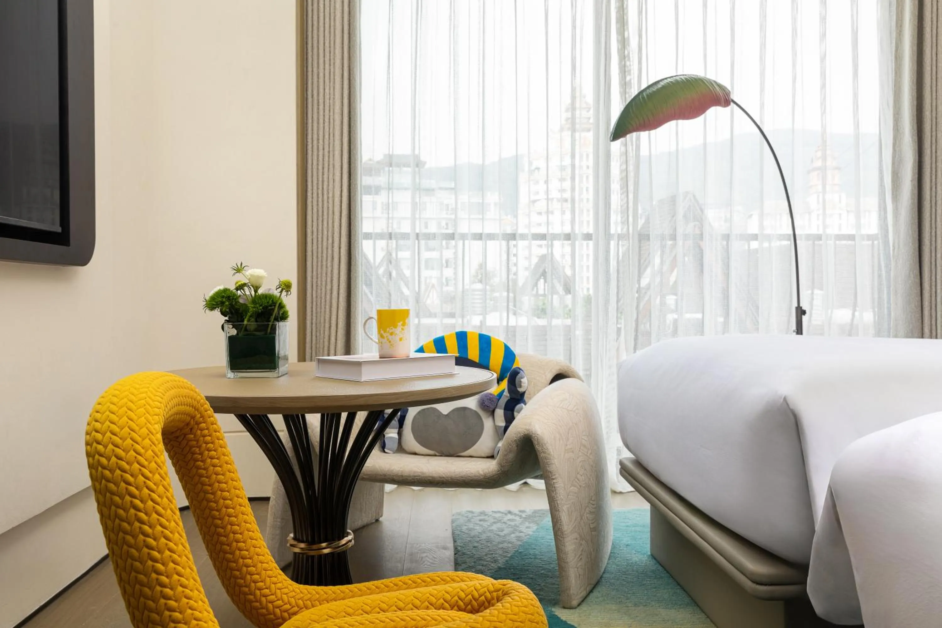 Bed in voco Xishuangbanna Gaozhuang by IHG