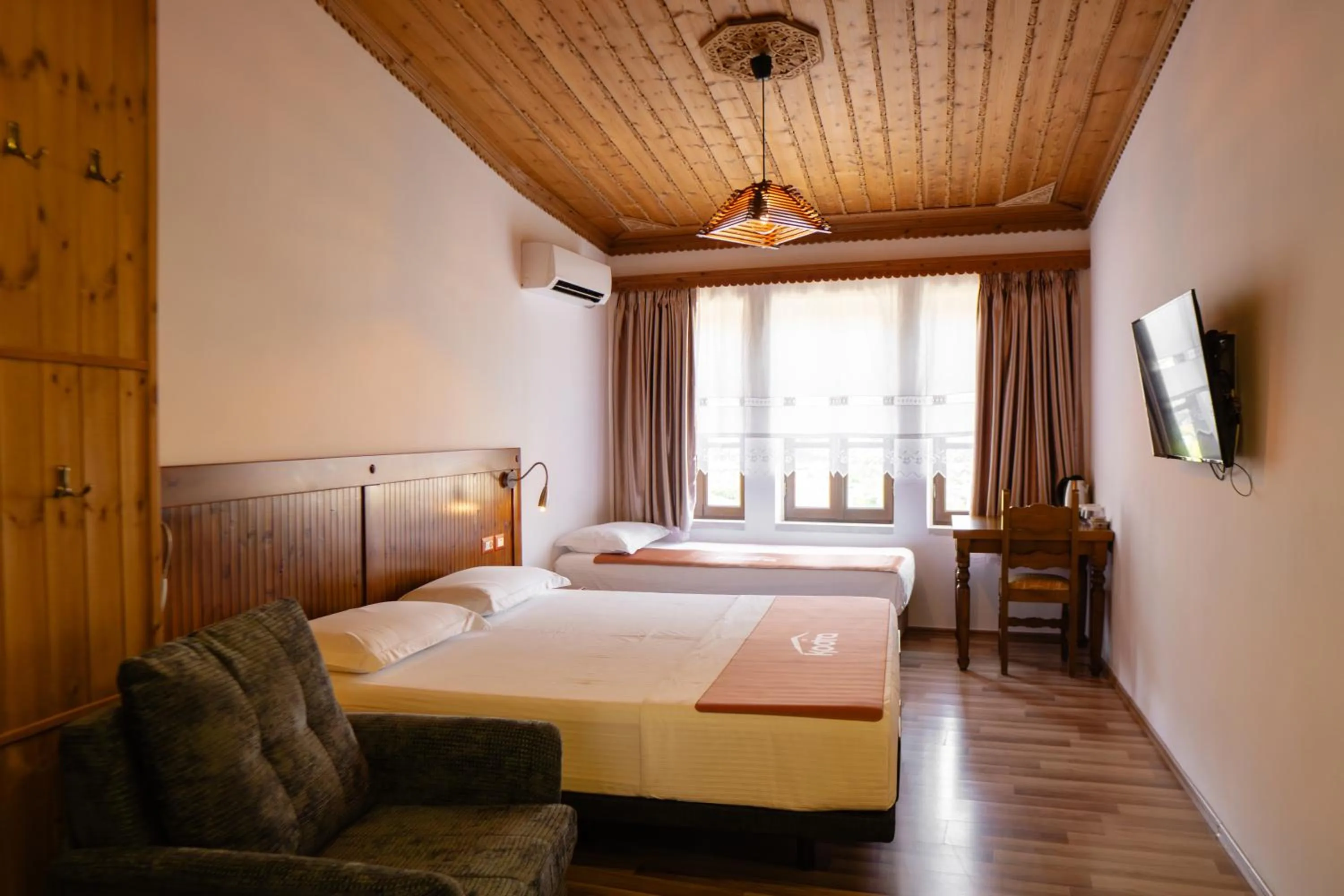 Bed in Hotel Kodra