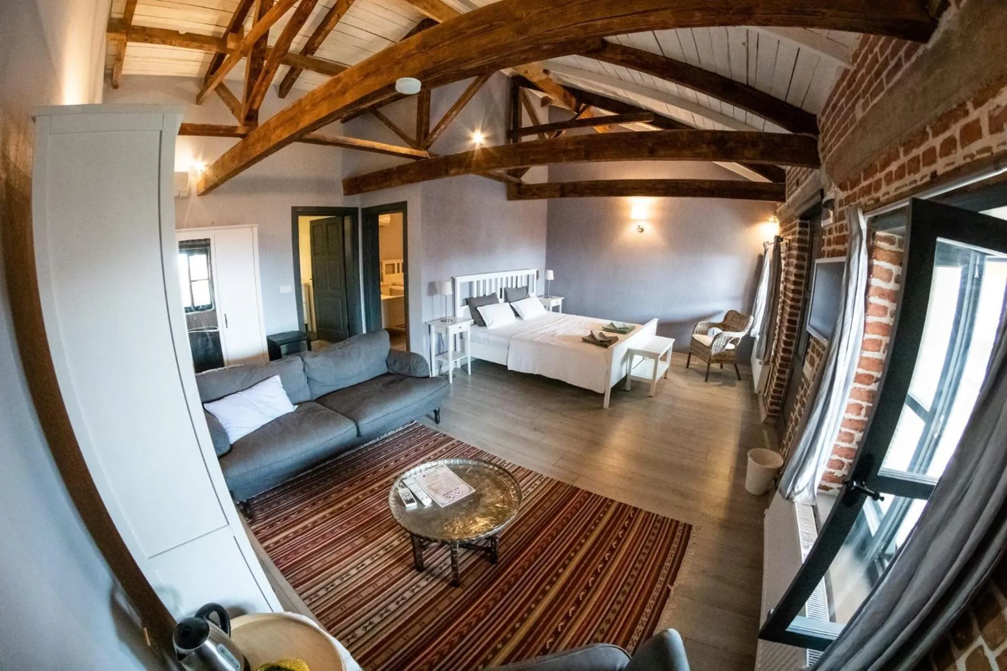 Bed in Attalos Suites Hotel