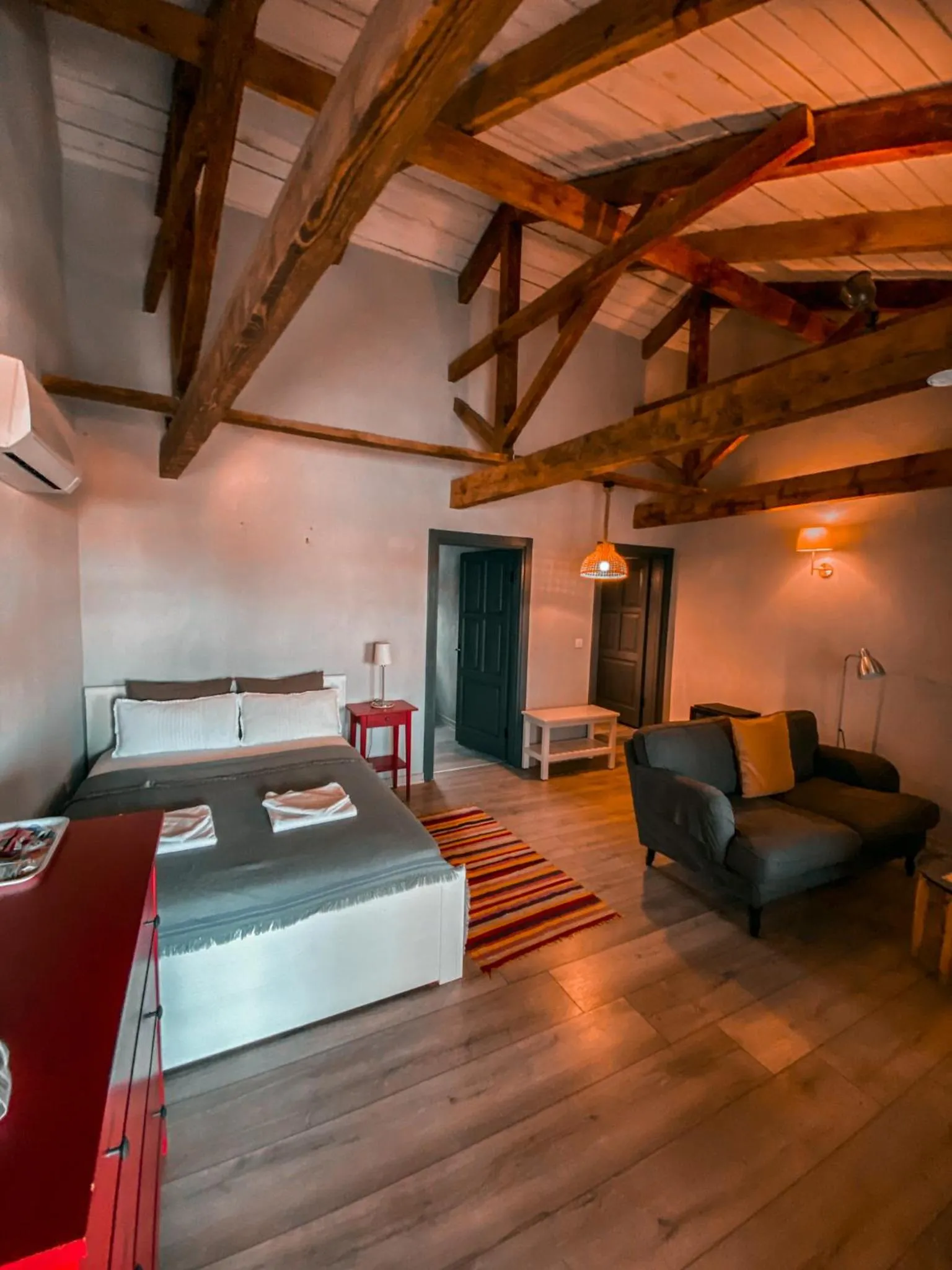 Bed in Attalos Suites Hotel