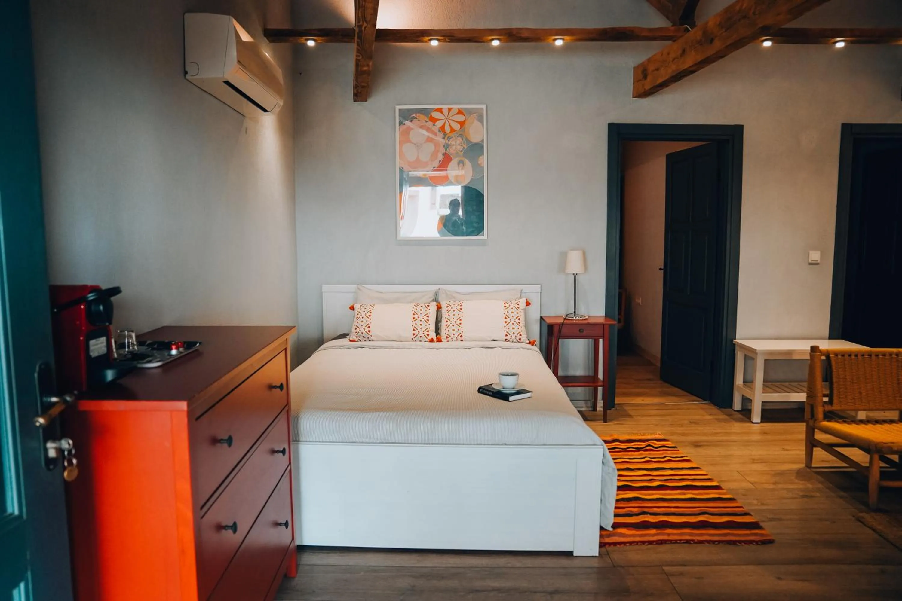 Bed in Attalos Suites Hotel