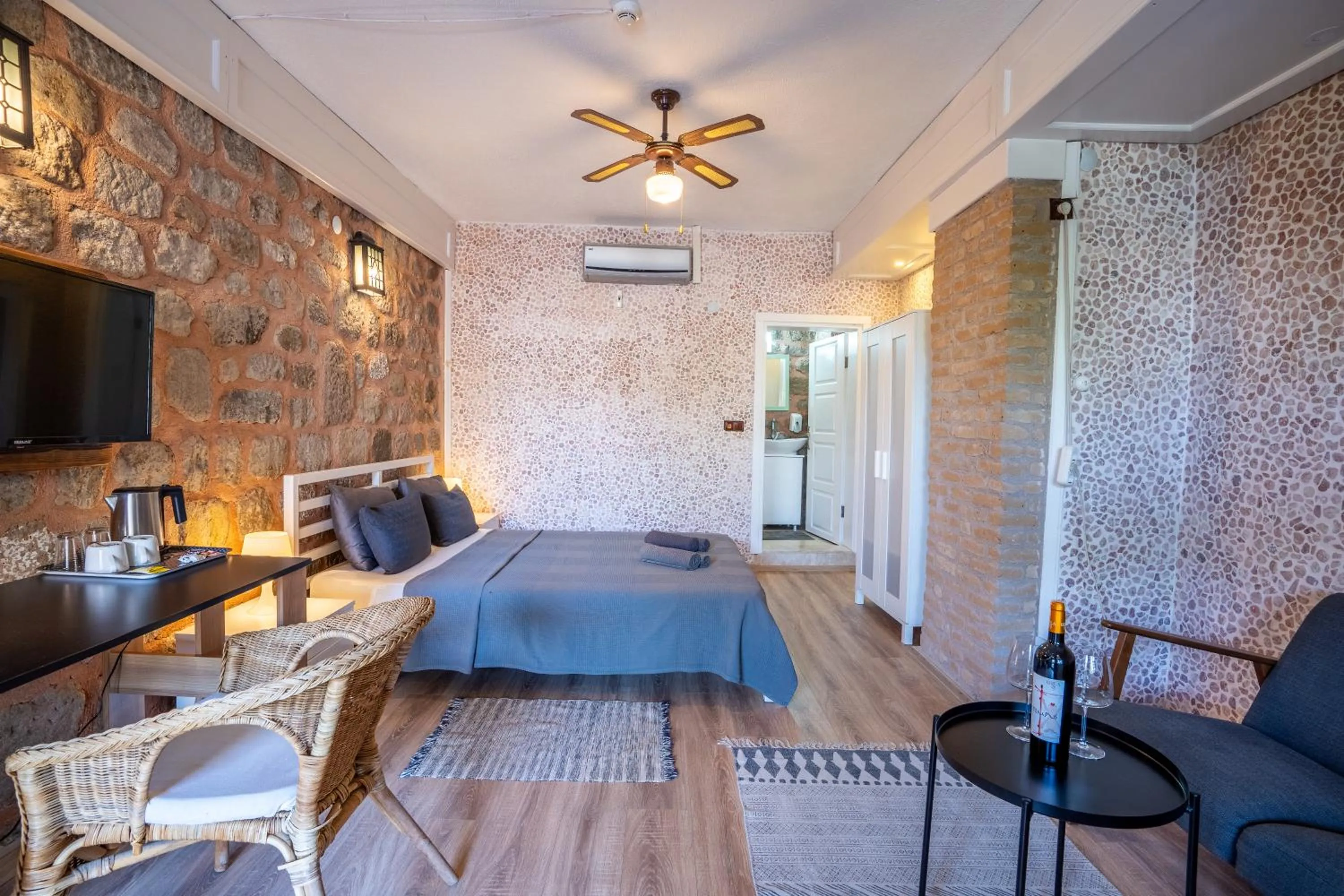 Bed in Attalos Suites Hotel