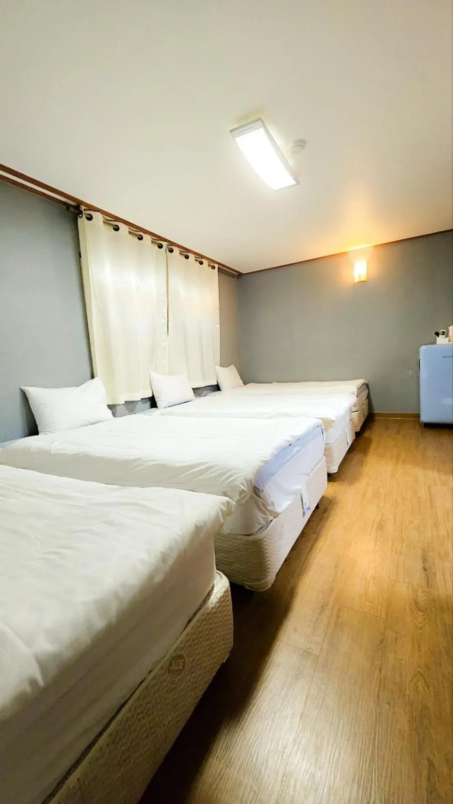 Bed in Jeju EQ Stay