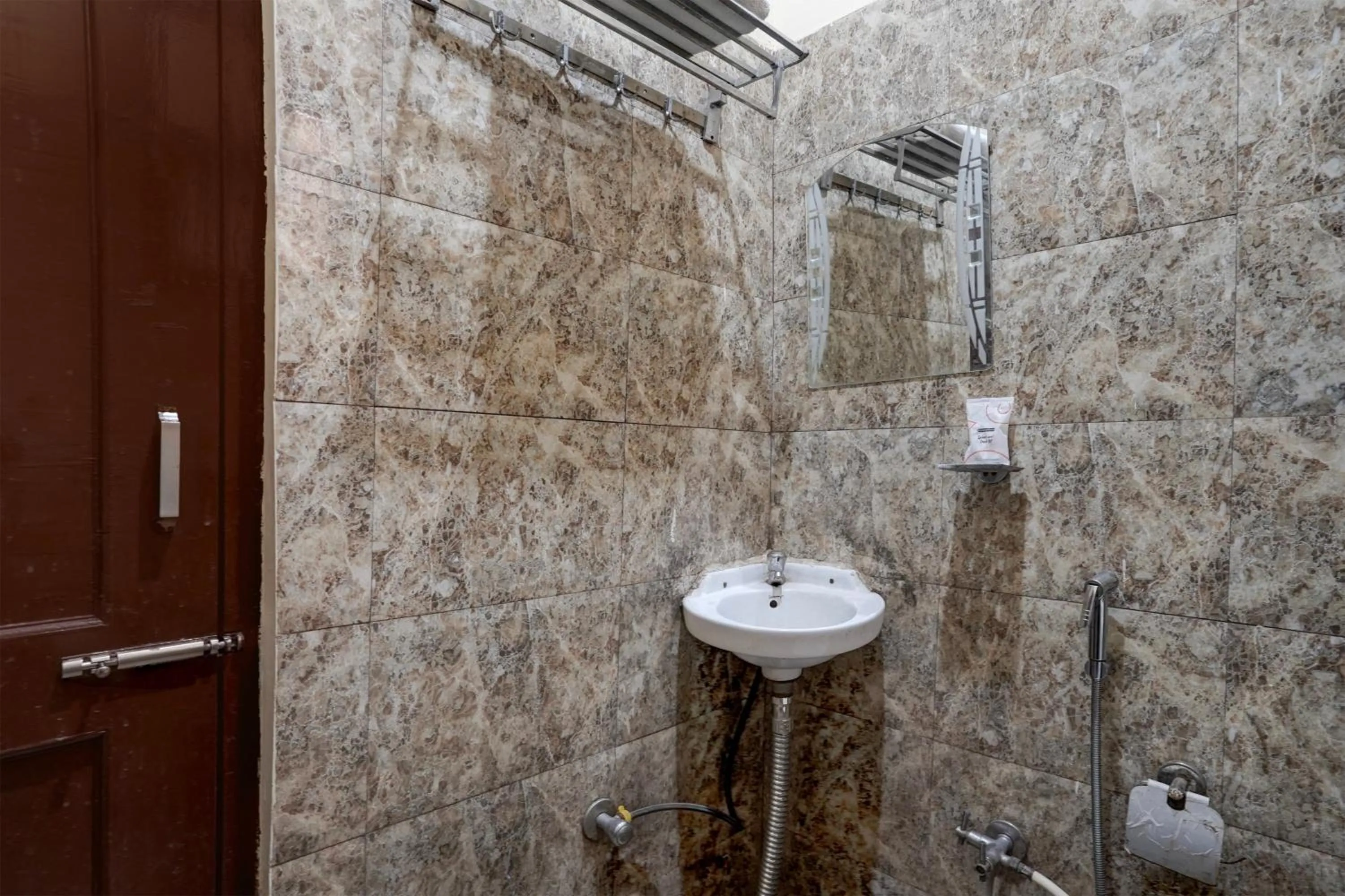 Bathroom in Super Hotel O Sector 58 Mohali Formerly Hotel Alpha