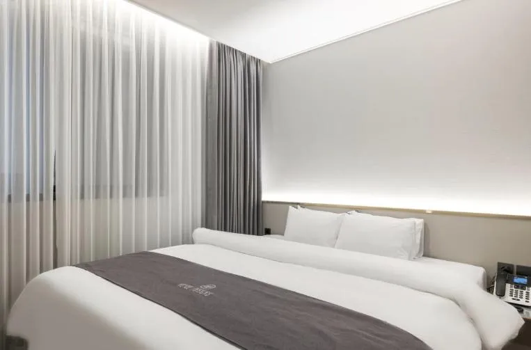 Bed in Hotel 7 Bricks Gwangju Sangmu