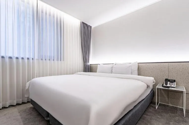 Bed in Hotel 7 Bricks Gwangju Sangmu