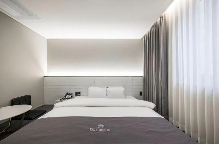 Bed in Hotel 7 Bricks Gwangju Sangmu