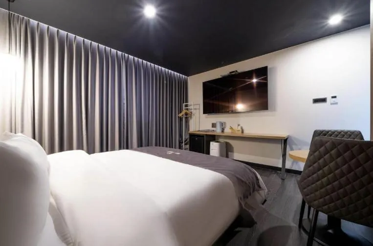 Bed in Hotel 7 Bricks Gwangju Sangmu