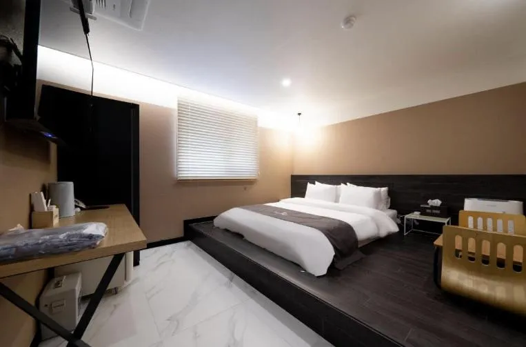 Bed in Hotel 7 Bricks Gwangju Sangmu