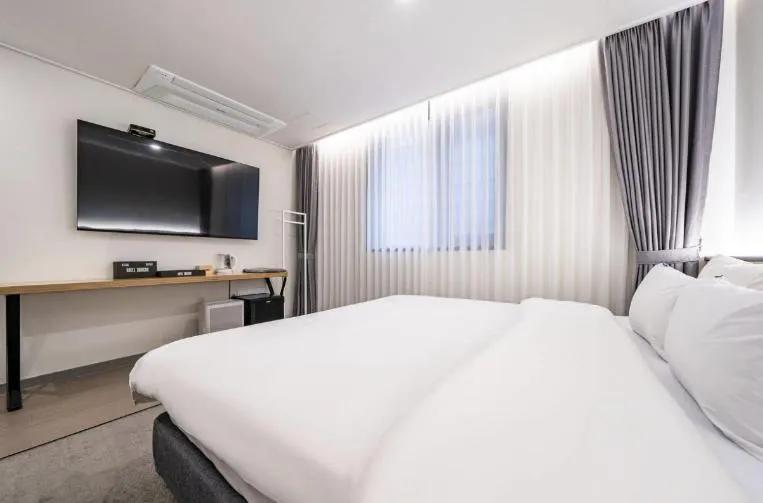 Bed in Hotel 7 Bricks Gwangju Sangmu