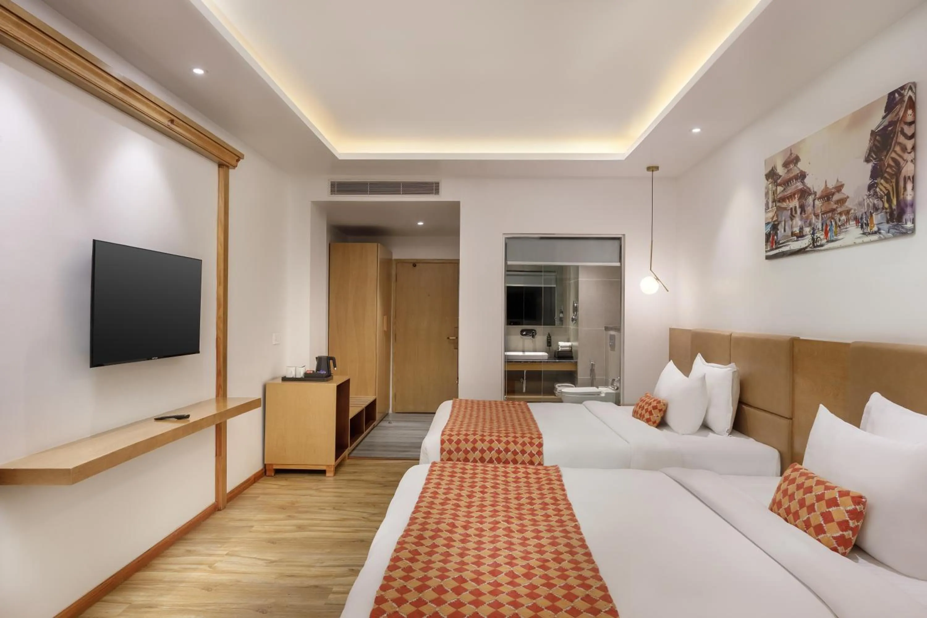 Communal lounge/ TV room, Bed in Hotel Anuttara