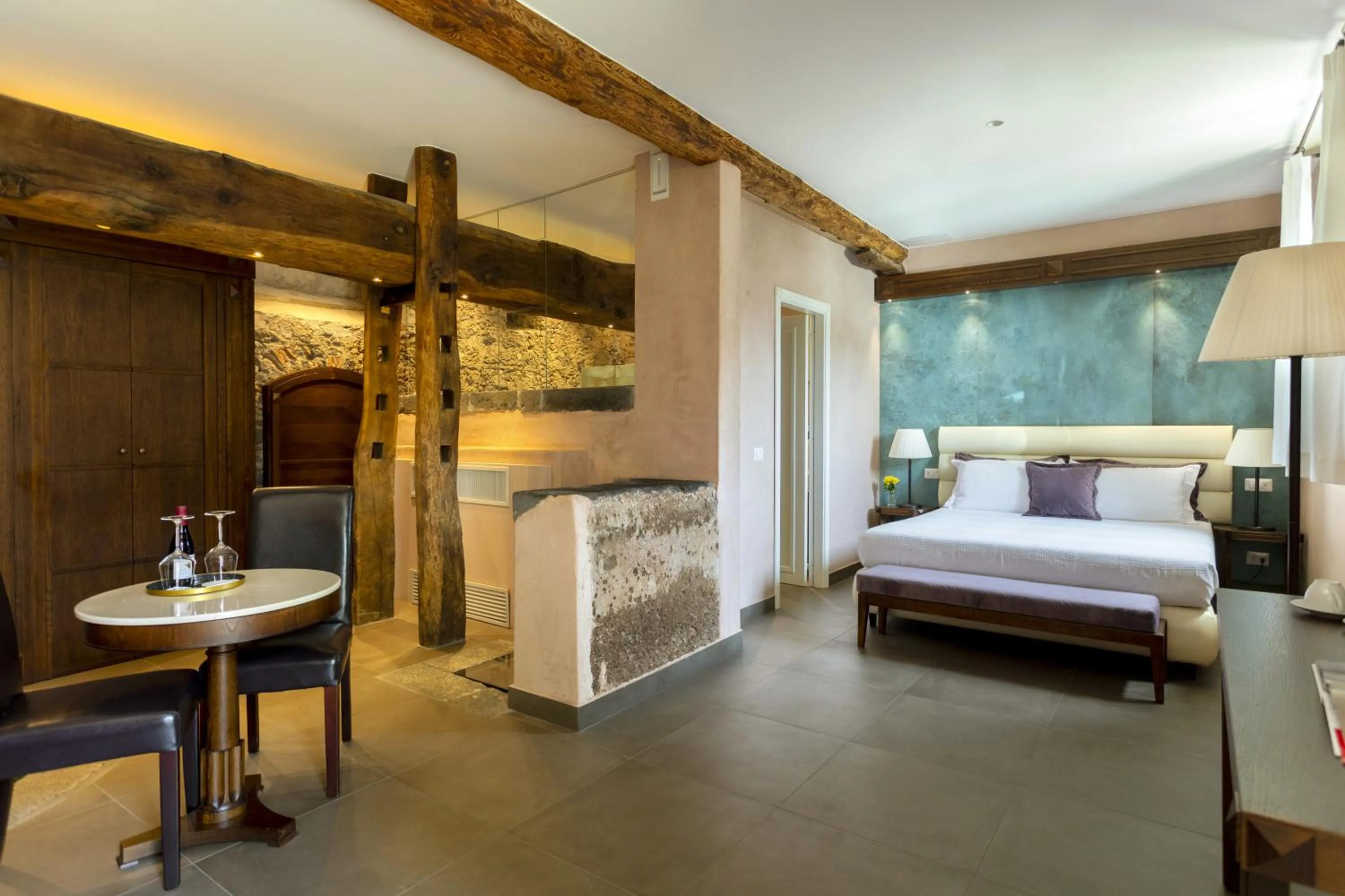 Bed in Firriato Hospitality Cavanera Etnea Resort & Wine Experience