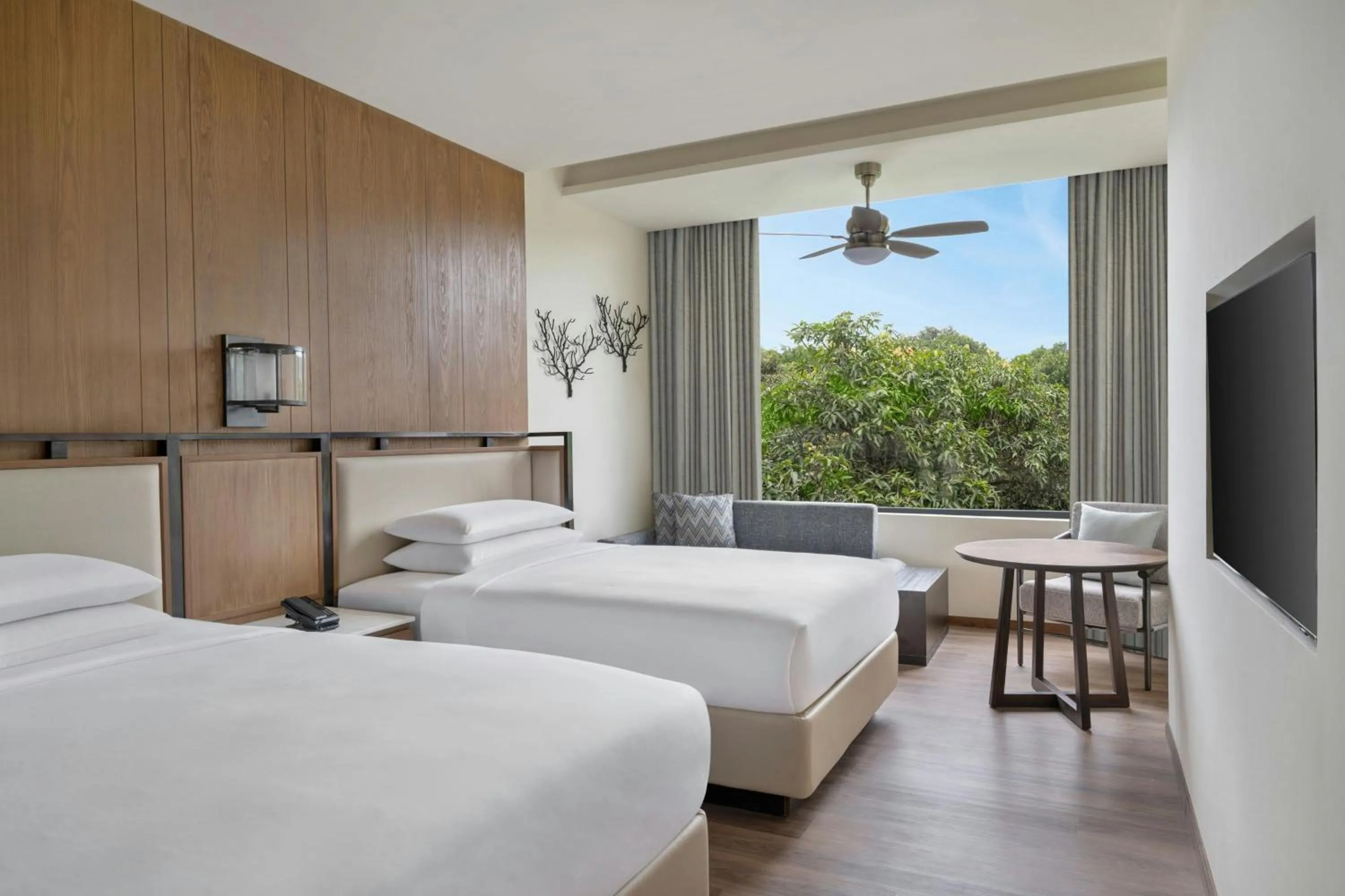 Photo of the whole room, Bed in Jim Corbett Marriott Resort & Spa