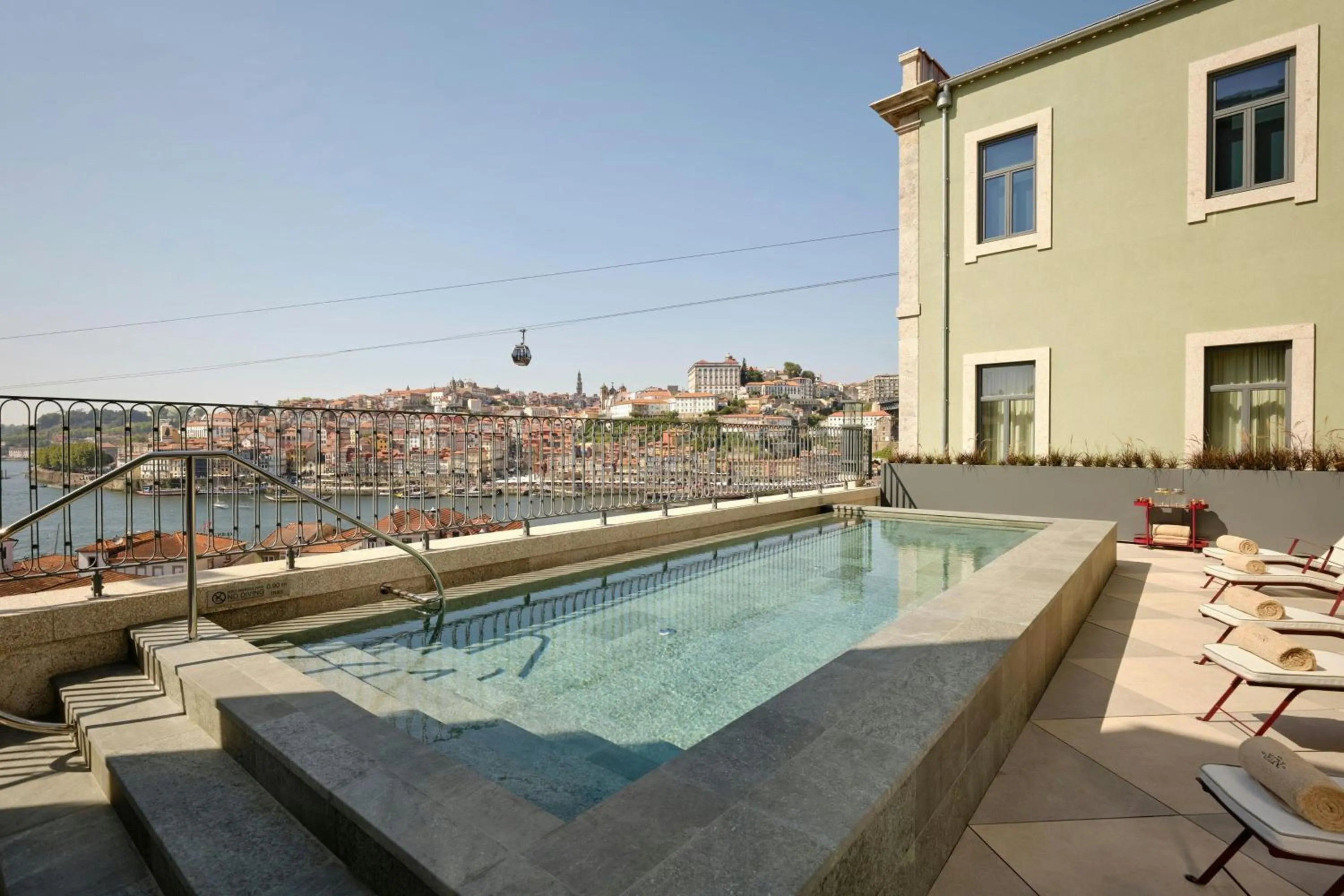 Swimming pool in Origine Porto Gaia, a Tribute Portfolio Hotel