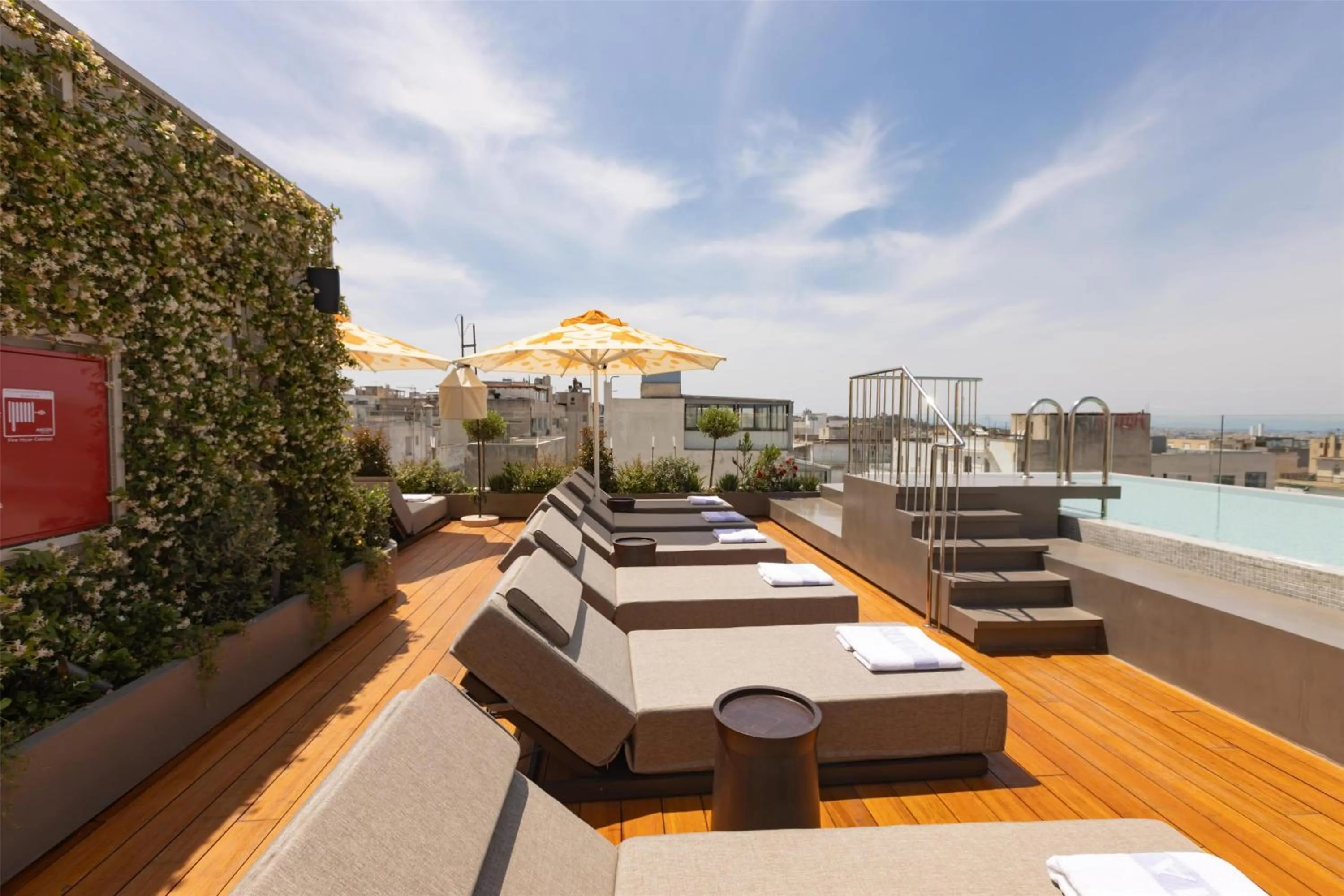 Pool view in Adia Aluma Athens, Curio Collection By Hilton