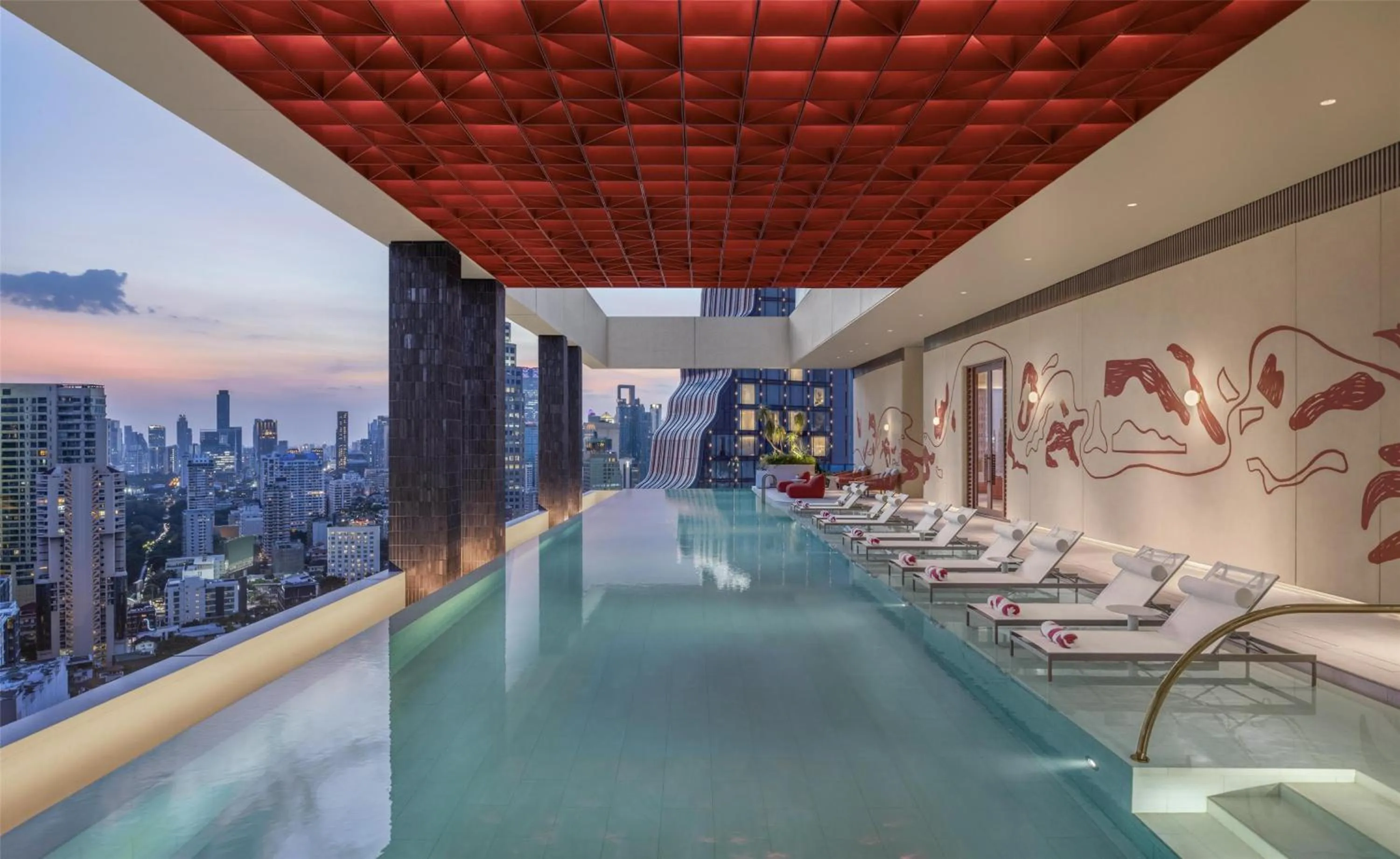 Pool view in Kromo Bangkok, Curio Collection By Hilton