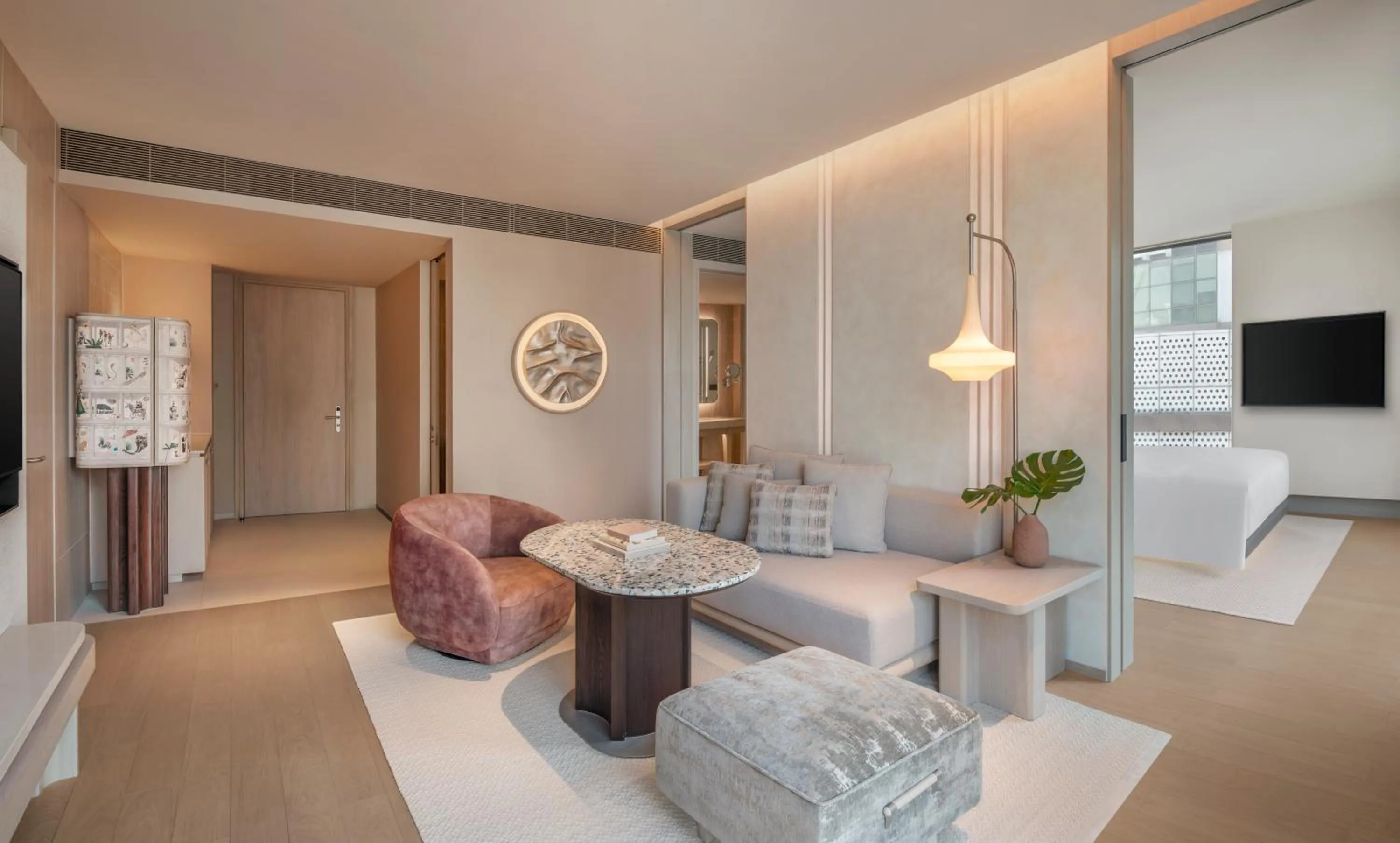 Living room in Kromo Bangkok, Curio Collection By Hilton