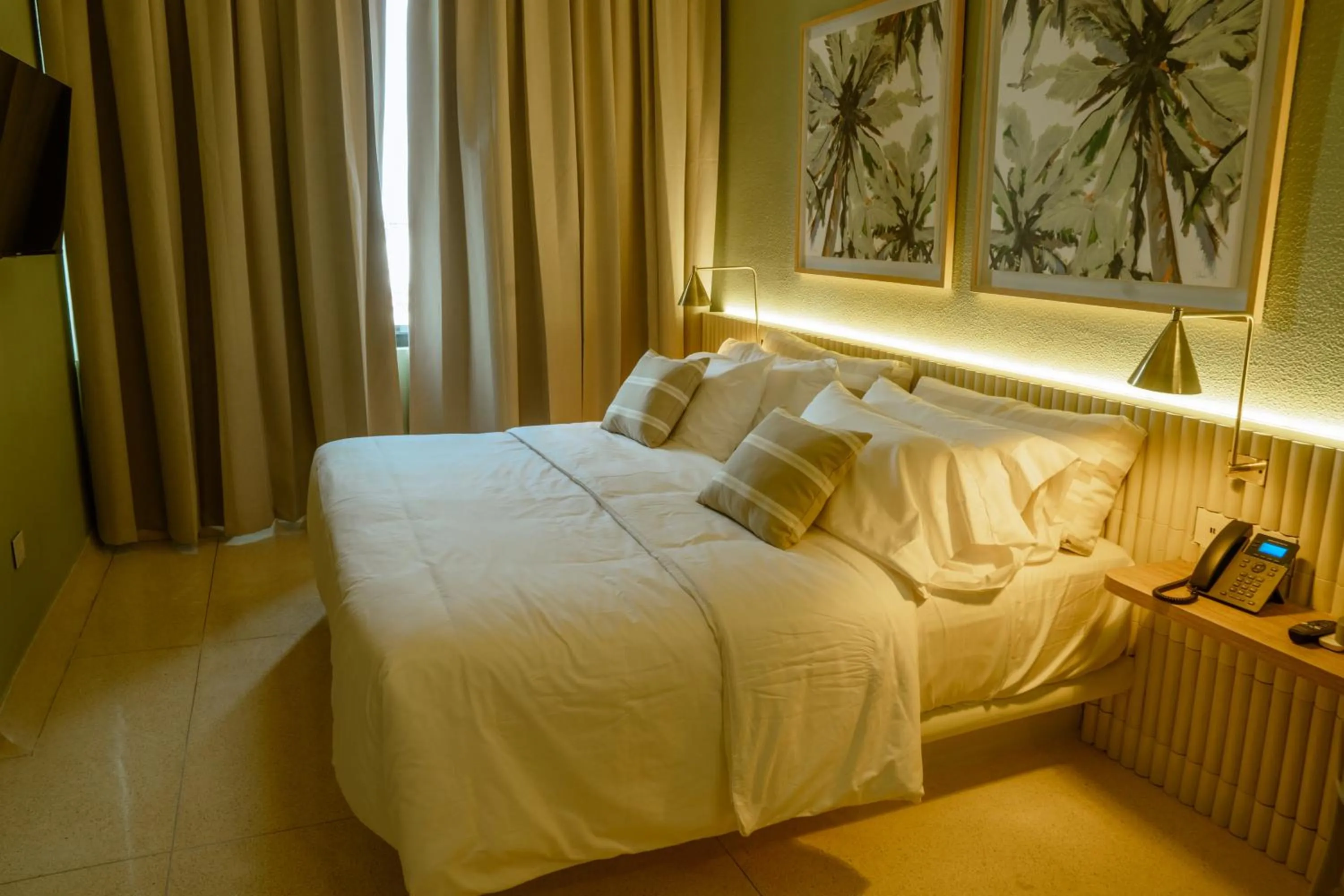 Bed in Terrazas Hotel Boutique