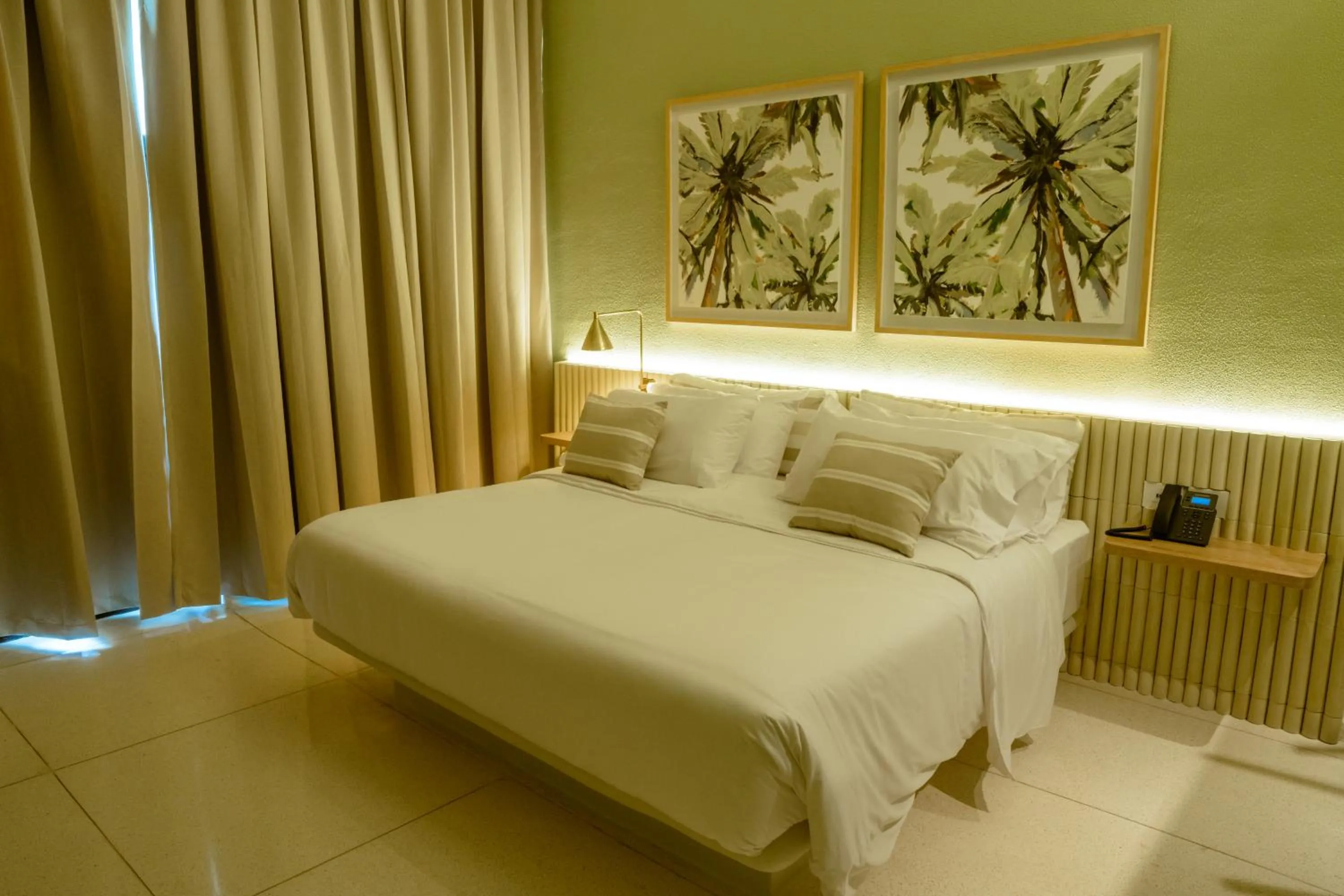 Bed in Terrazas Hotel Boutique