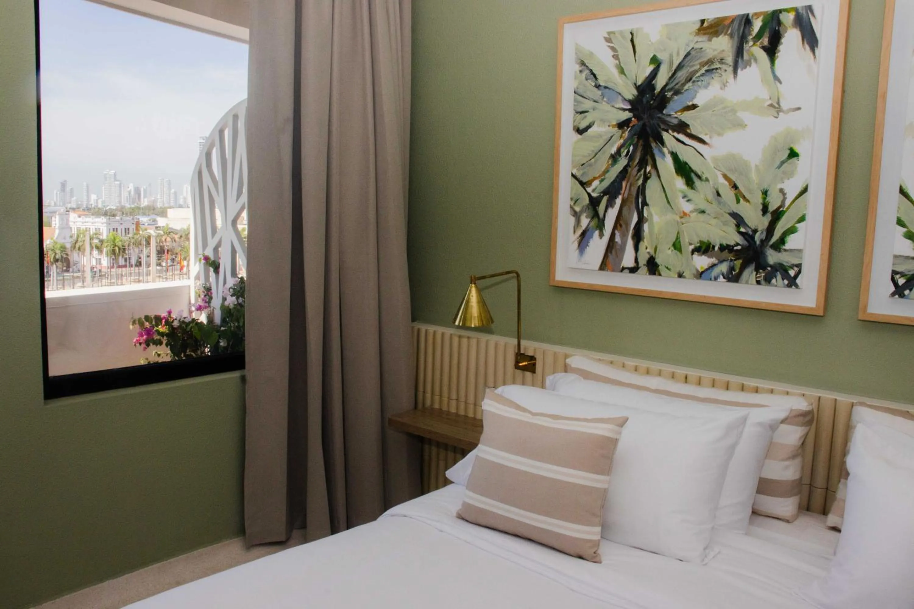 Bed in Terrazas Hotel Boutique