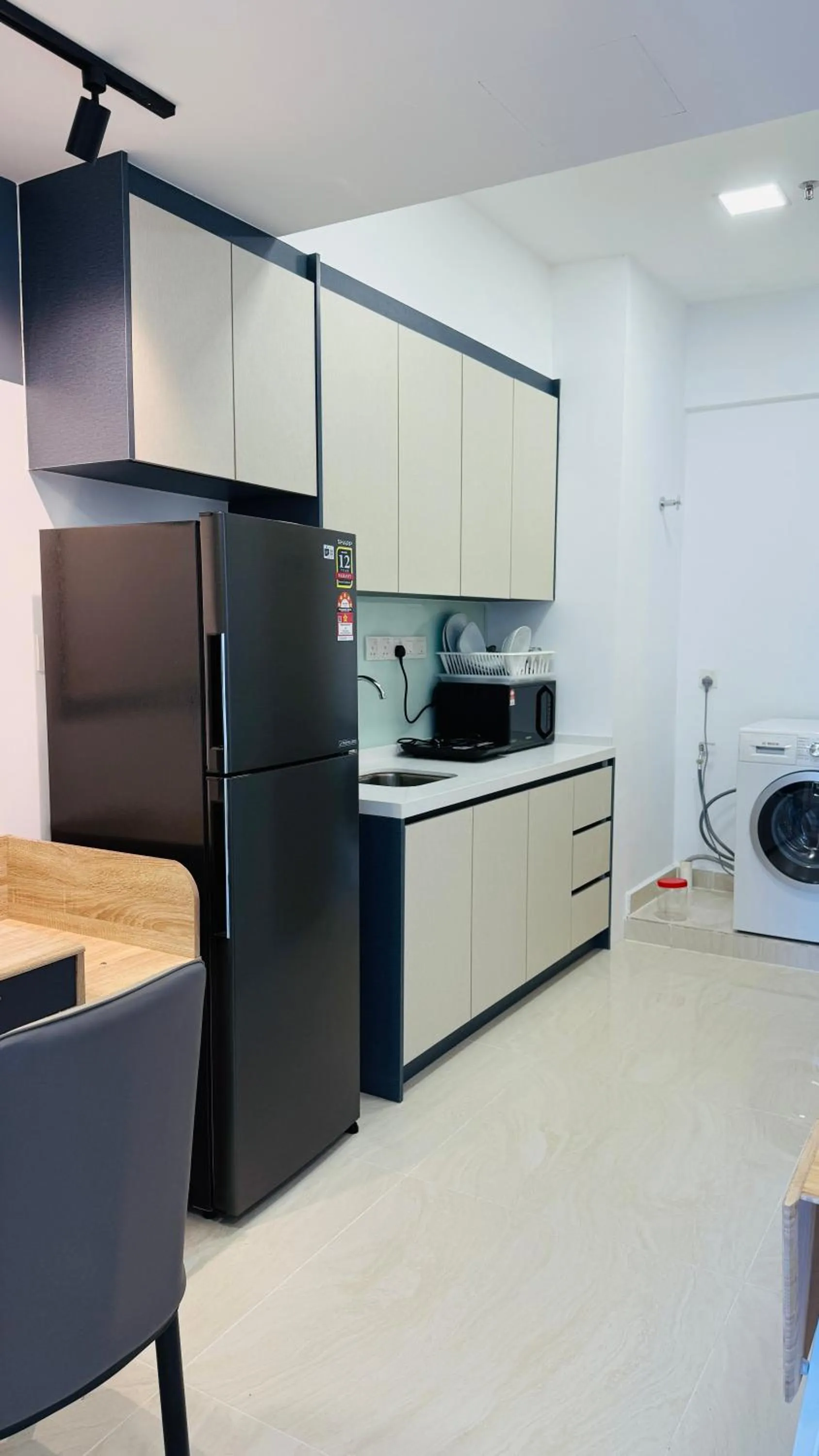 Kitchen or kitchenette in The Colony By Infinitum Flixses