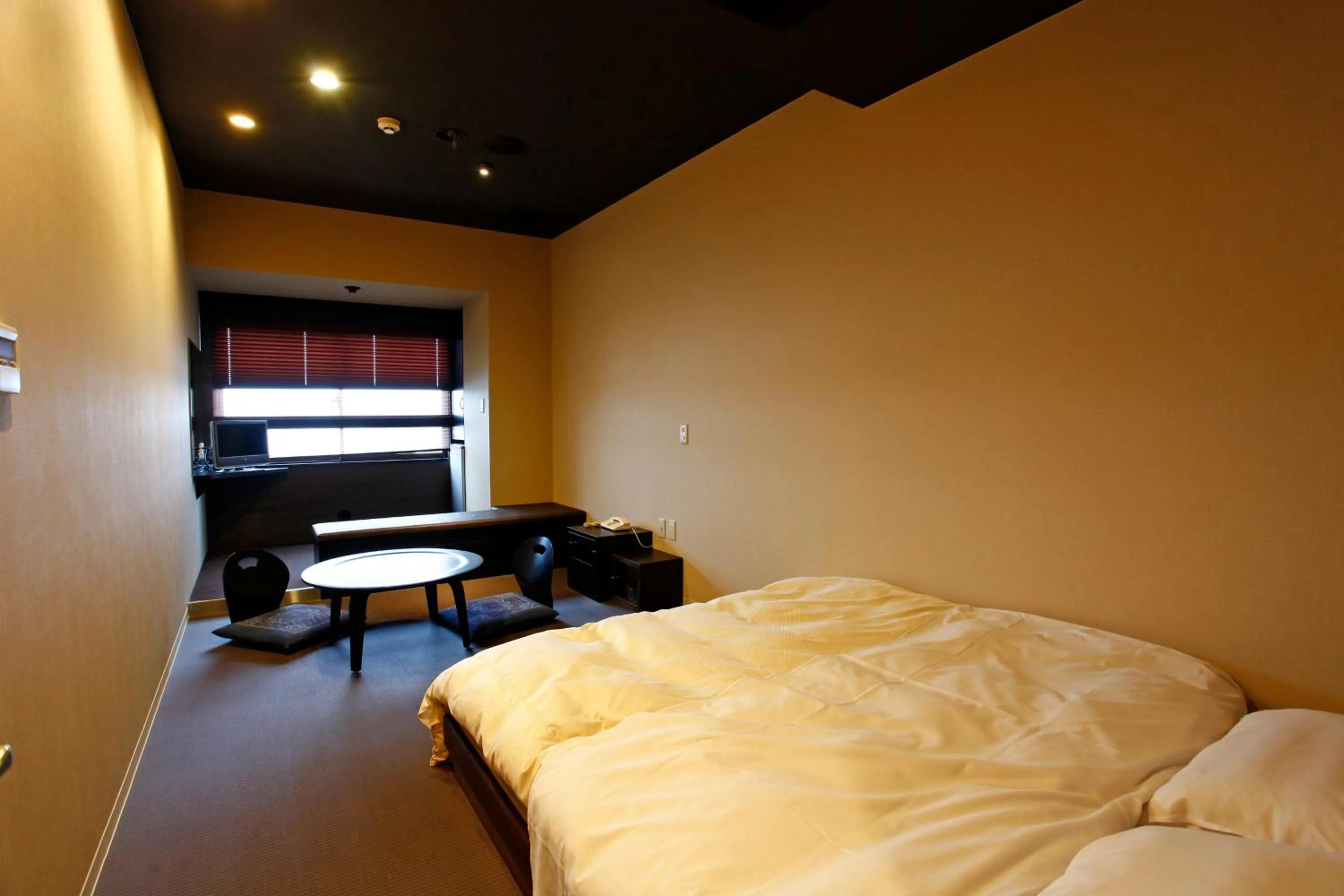 Bed in Hotel Shosenkaku Romankan