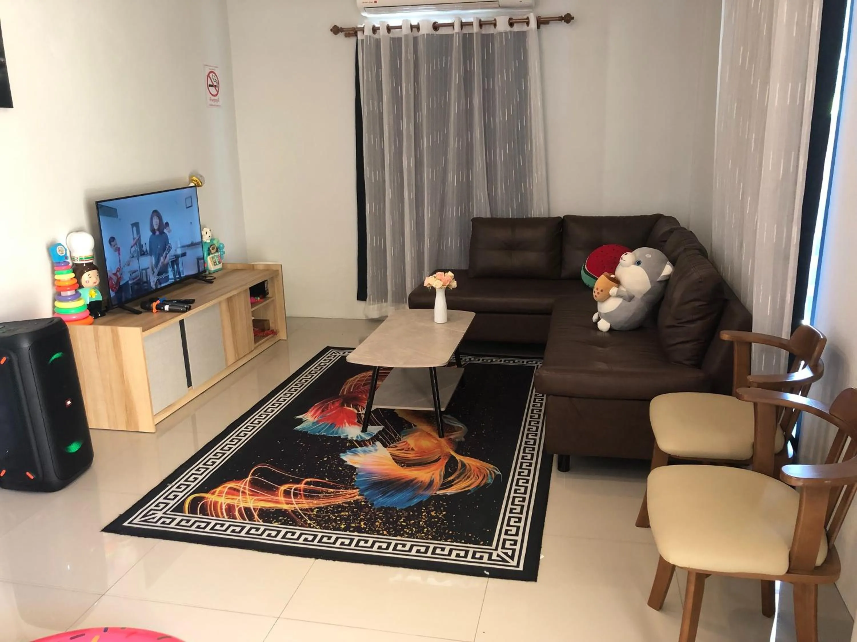 Seating area in Suksabai Raiwan and Pool Villa