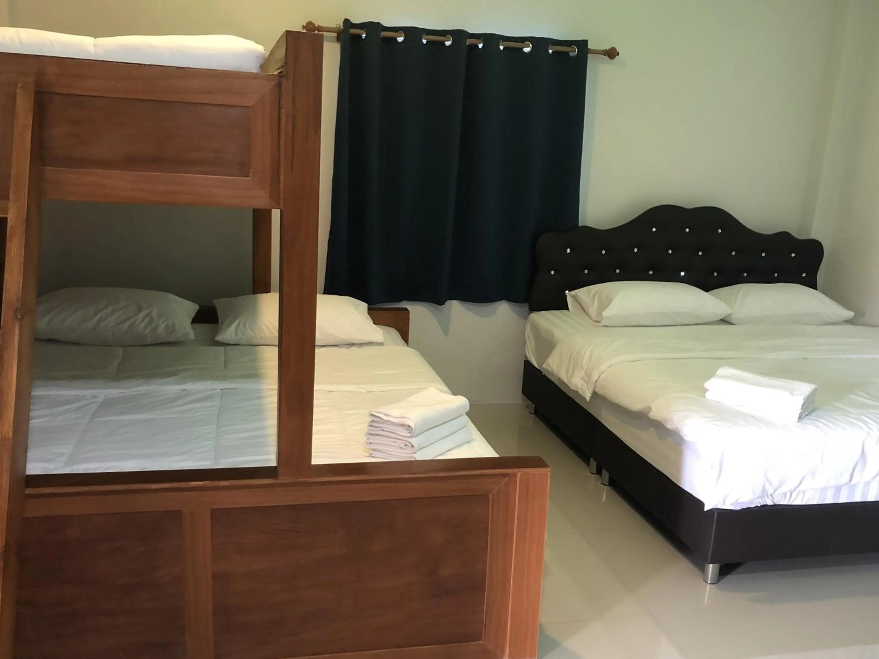 Bed in Suksabai Raiwan and Pool Villa