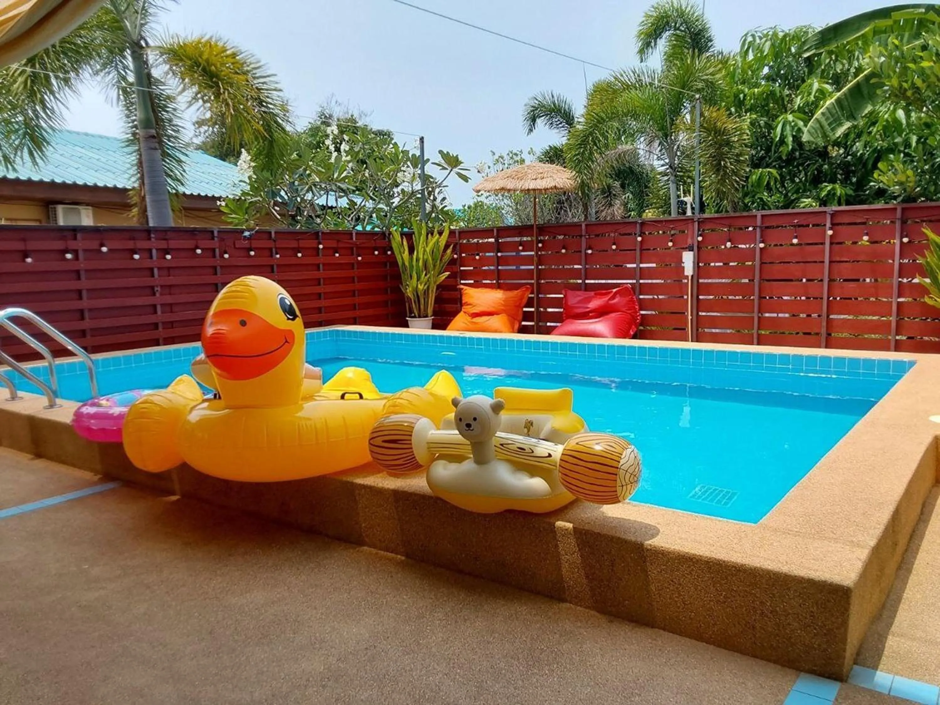 Swimming pool in Suksabai Raiwan and Pool Villa