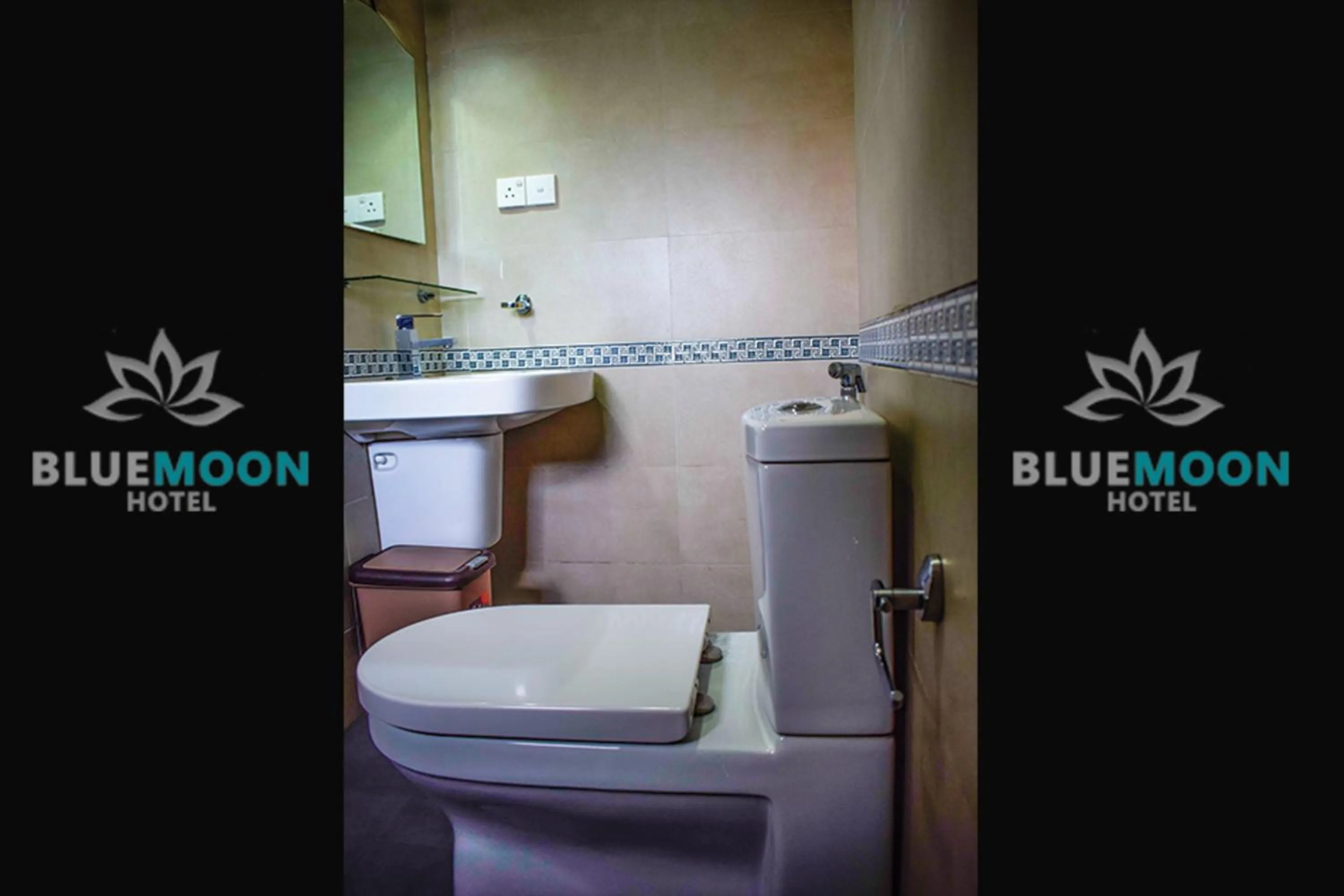 Toilet in Blue Moon Hotel