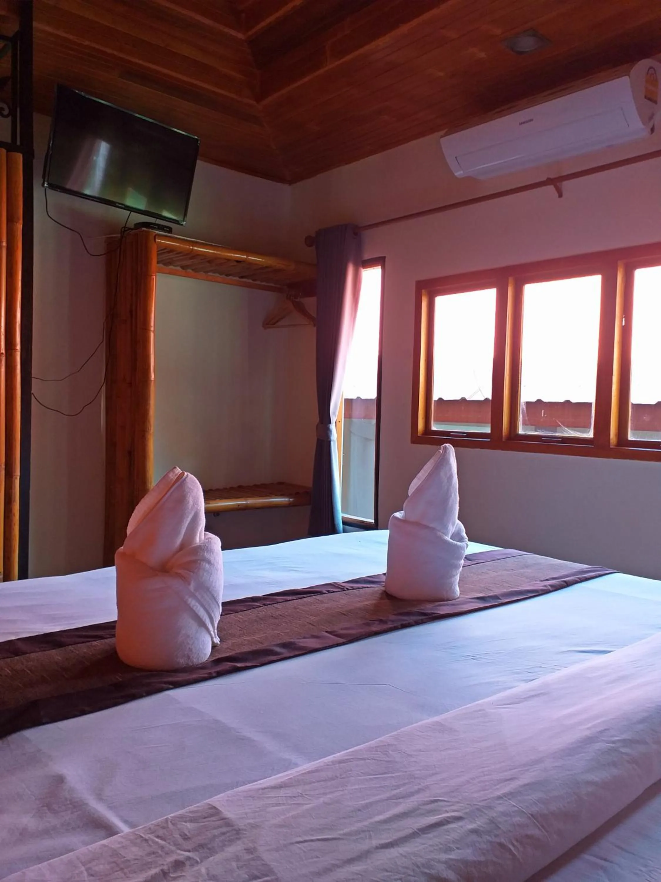 Bed in The Ford SunSet Beach Resort