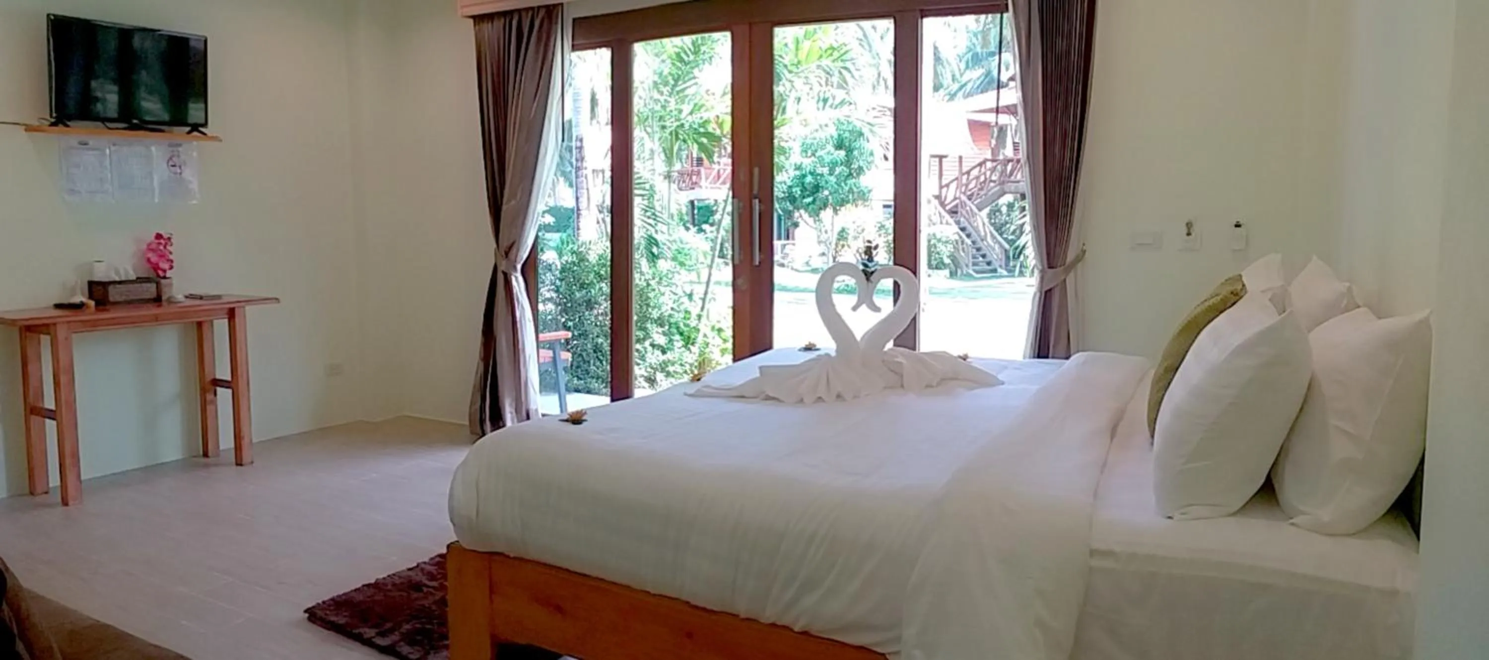 Bed in The Ford SunSet Beach Resort